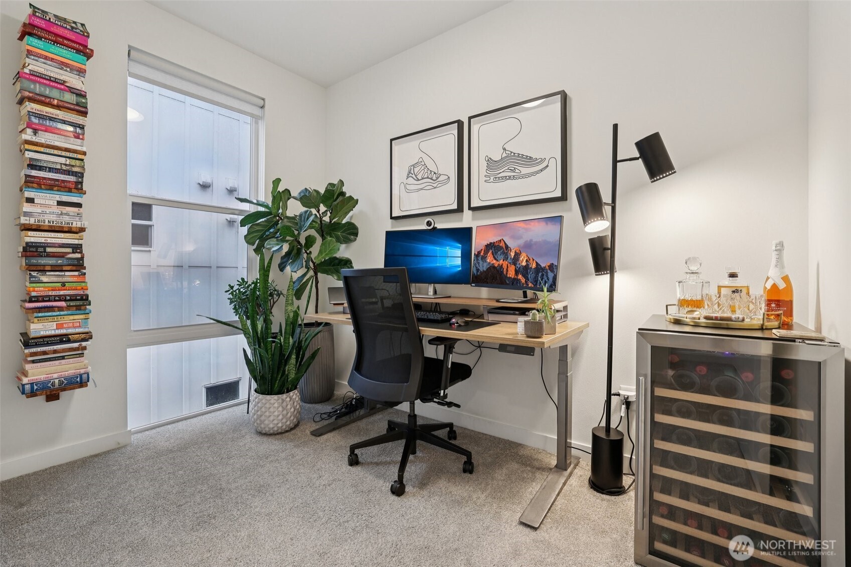 2403 Southwest Edmunds Street Seattle, WA 98106 - Photo 16 of 25 a view of a workspace with furniture and a potted plant