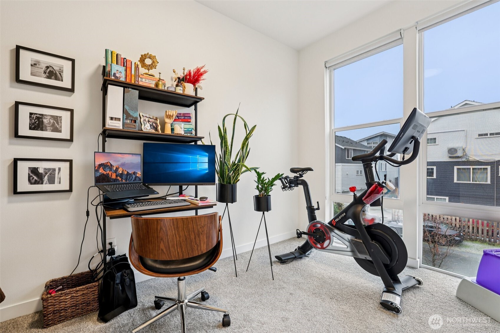 2403 Southwest Edmunds Street Seattle, WA 98106 - Photo 19 of 25 a room with gym equipment and a flat screen tv