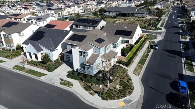 an aerial view of a house with a garden