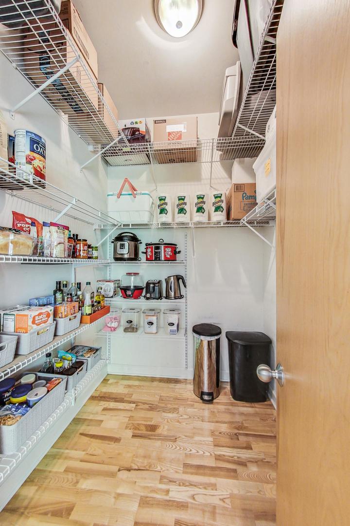 4150 North Sheridan Road, Unit 2S Chicago, IL 60613 - Photo 14 of 29 a storage room with washer and dryer