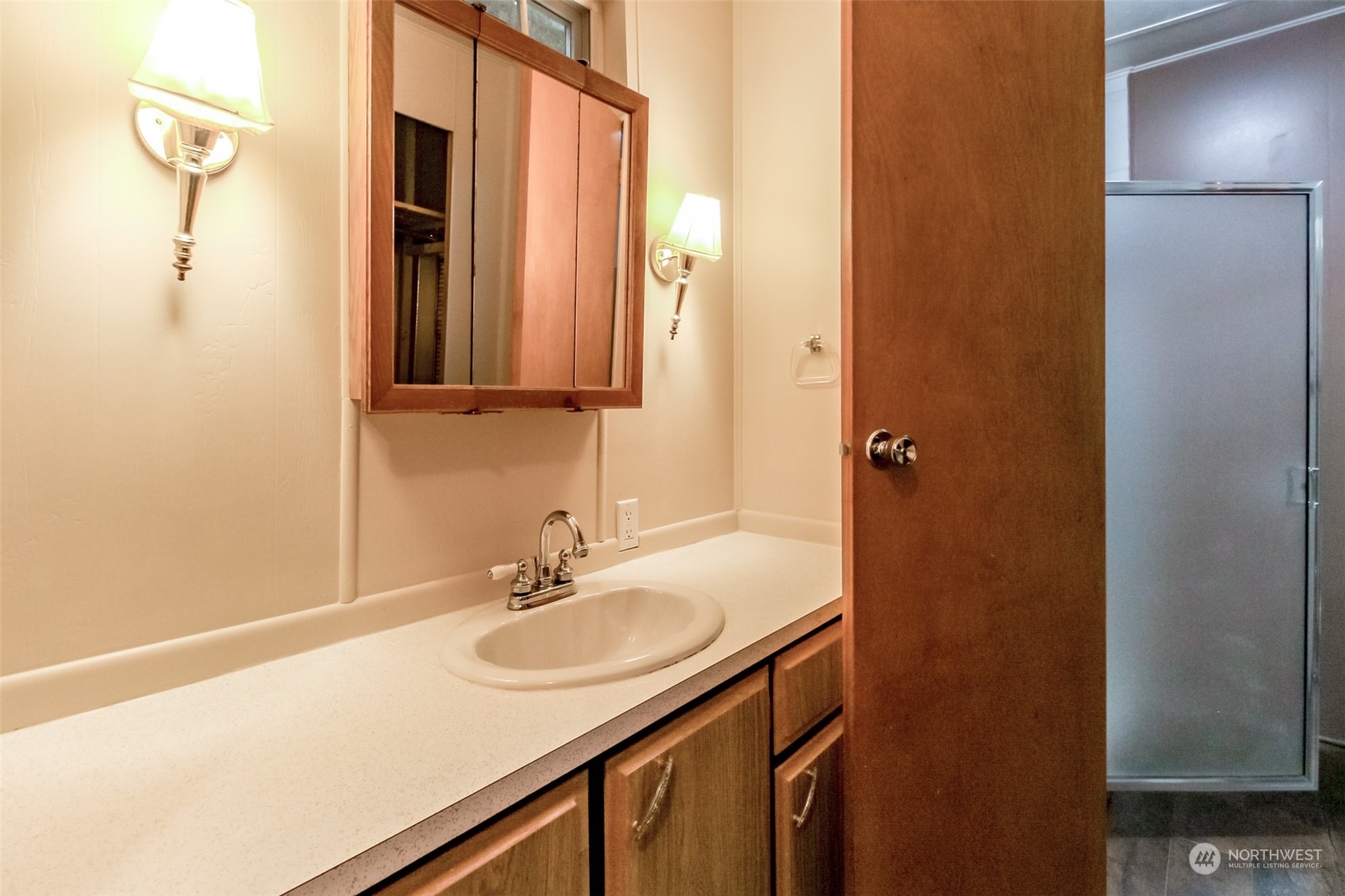 27508 220th Place Southeast Maple Valley, WA 98038 - Photo 17 of 25 a bathroom with a sink and a mirror