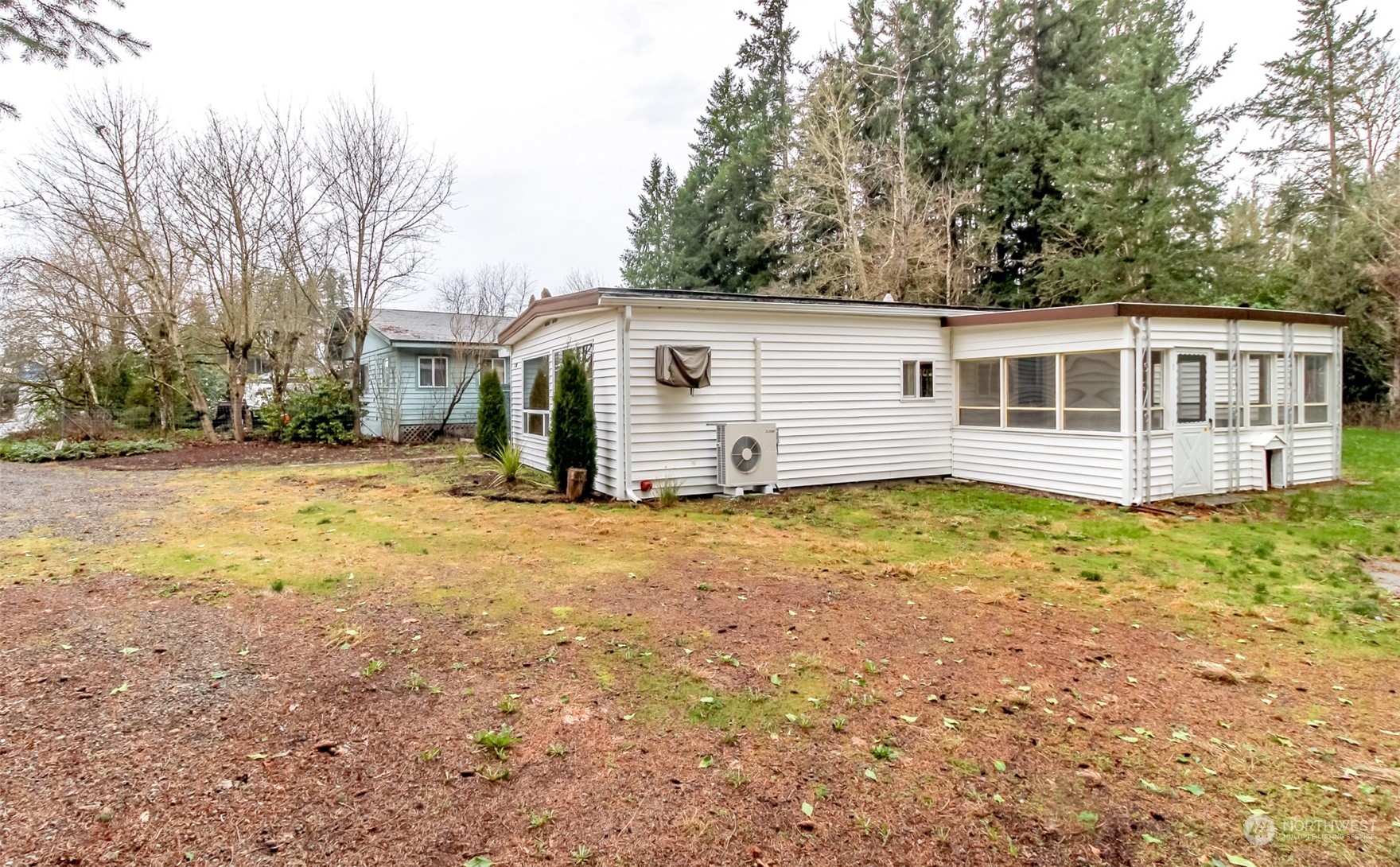 27508 220th Place Southeast Maple Valley, WA 98038 - Photo 2 of 25 a view of a house with backyard and garden