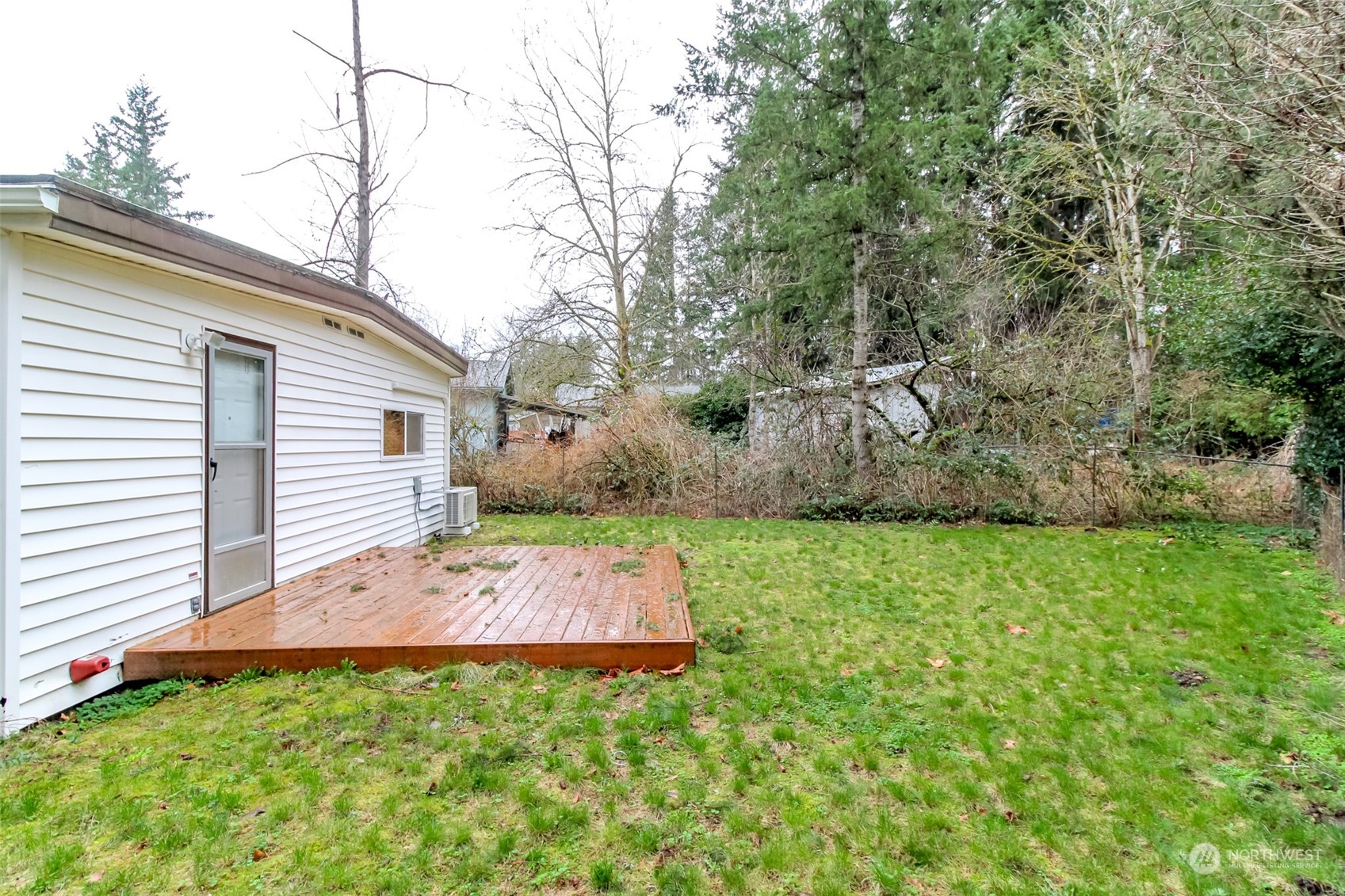 27508 220th Place Southeast Maple Valley, WA 98038 - Photo 25 of 25 a view of a backyard with plants and large trees