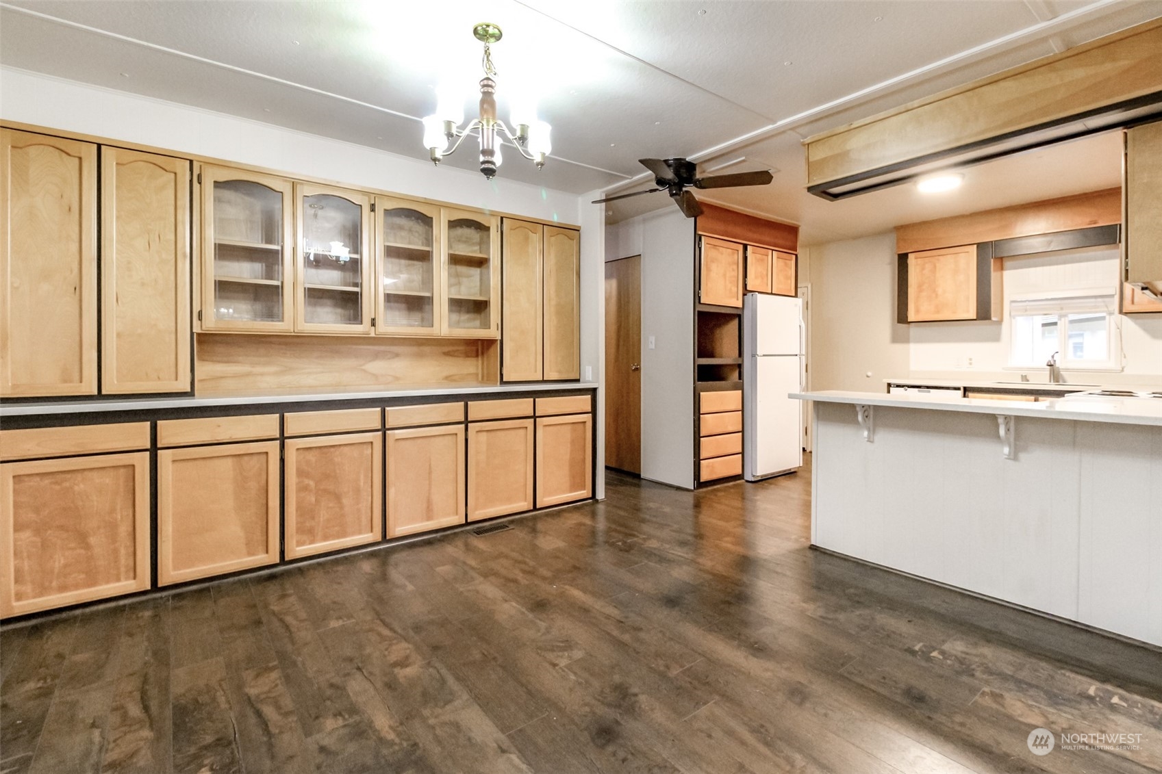27508 220th Place Southeast Maple Valley, WA 98038 - Photo 4 of 25 a view of an empty room with a kitchen