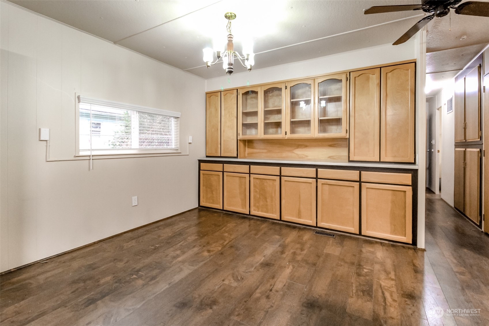 27508 220th Place Southeast Maple Valley, WA 98038 - Photo 5 of 25 wooden floor in an empty room with a window