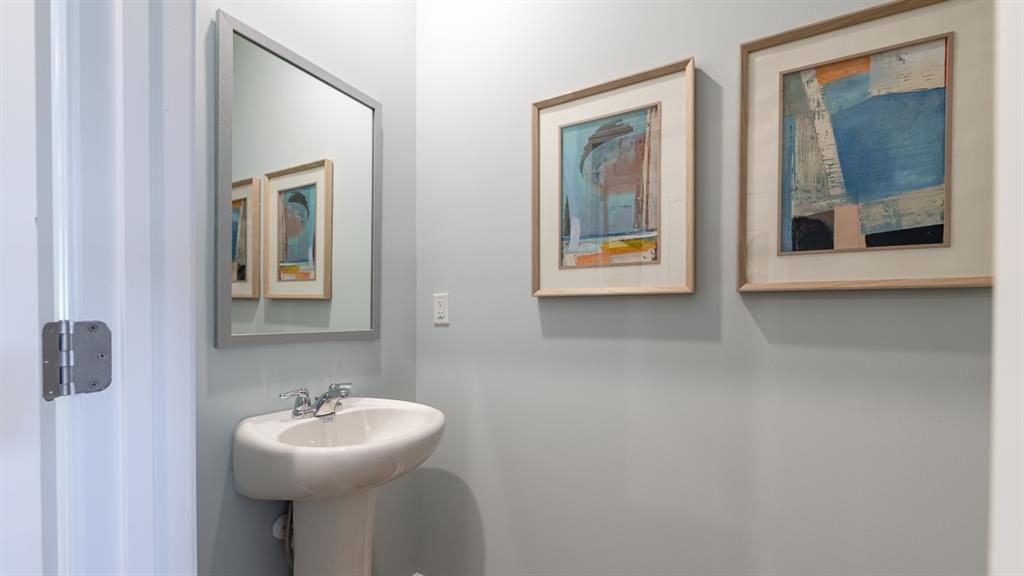 2082 Moss Hill Road Stone Mountain, GA 30083 - Photo 10 of 38 a bathroom with a sink and mirror