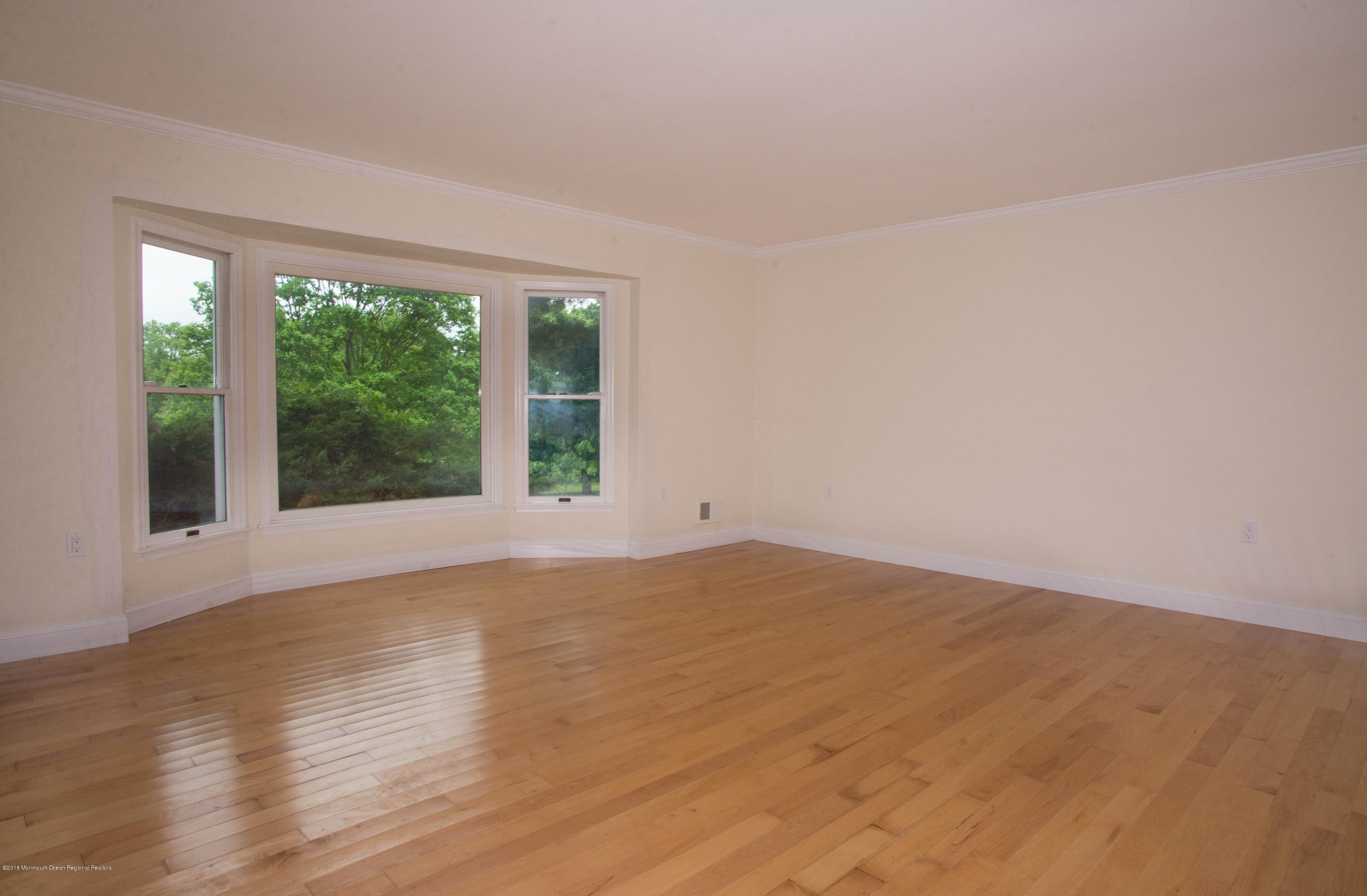 7 Red Hawk Road South Colts Neck, NJ 07722 - Photo 15 of 38 Living Room w/ Bay Windows