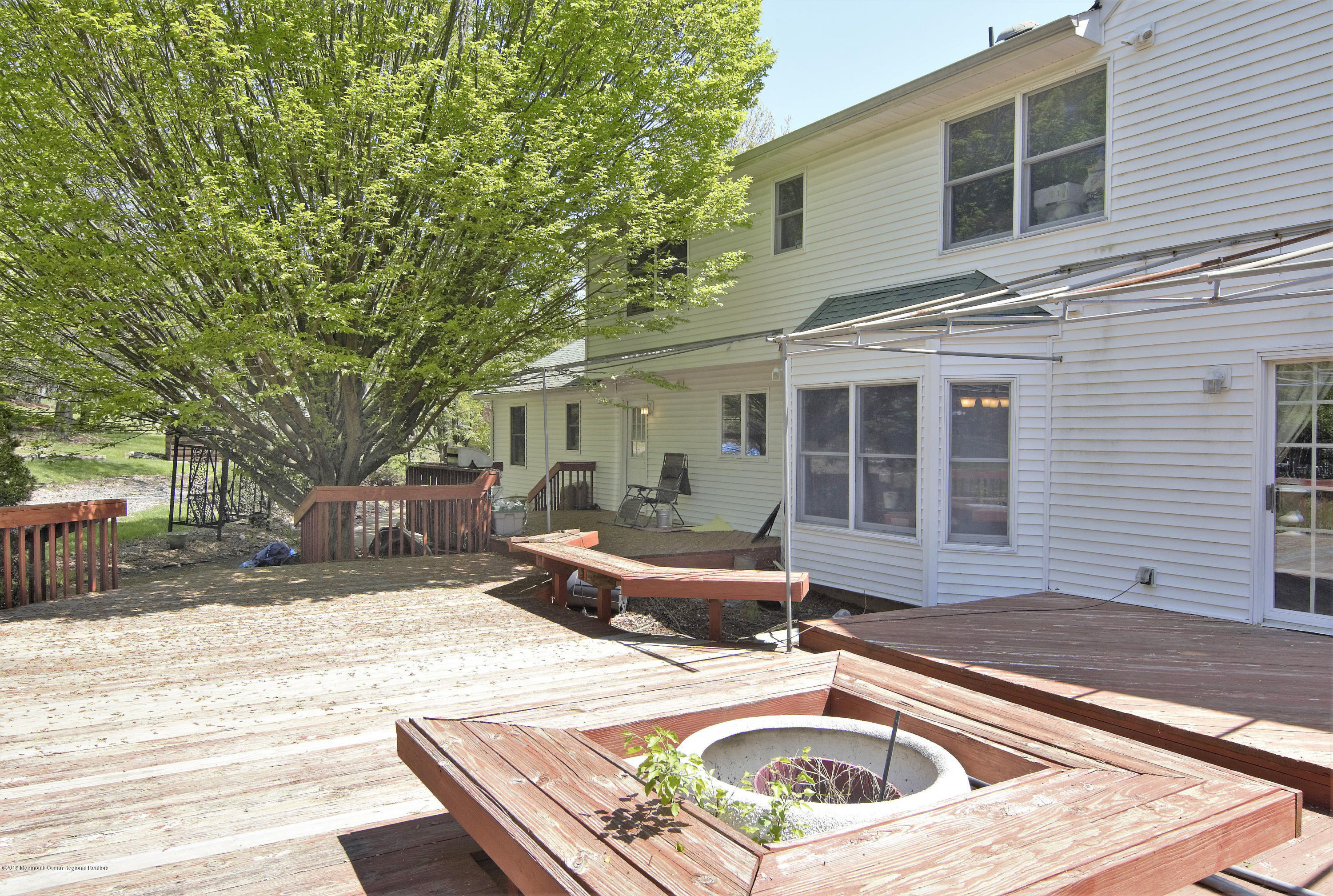7 Red Hawk Road South Colts Neck, NJ 07722 - Photo 30 of 38 Backyard with Large Deck