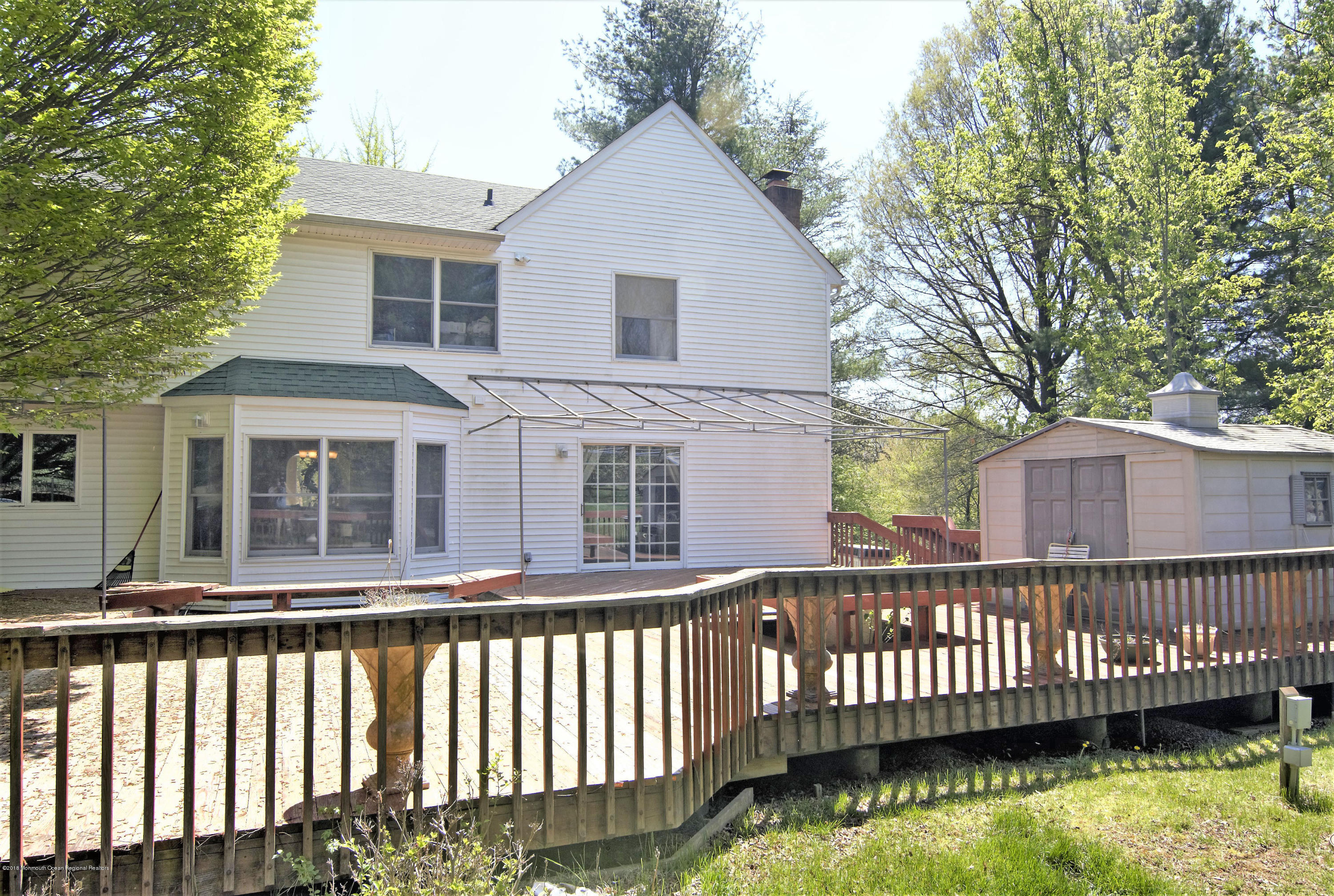 7 Red Hawk Road South Colts Neck, NJ 07722 - Photo 32 of 38 Back Yard Deck to House