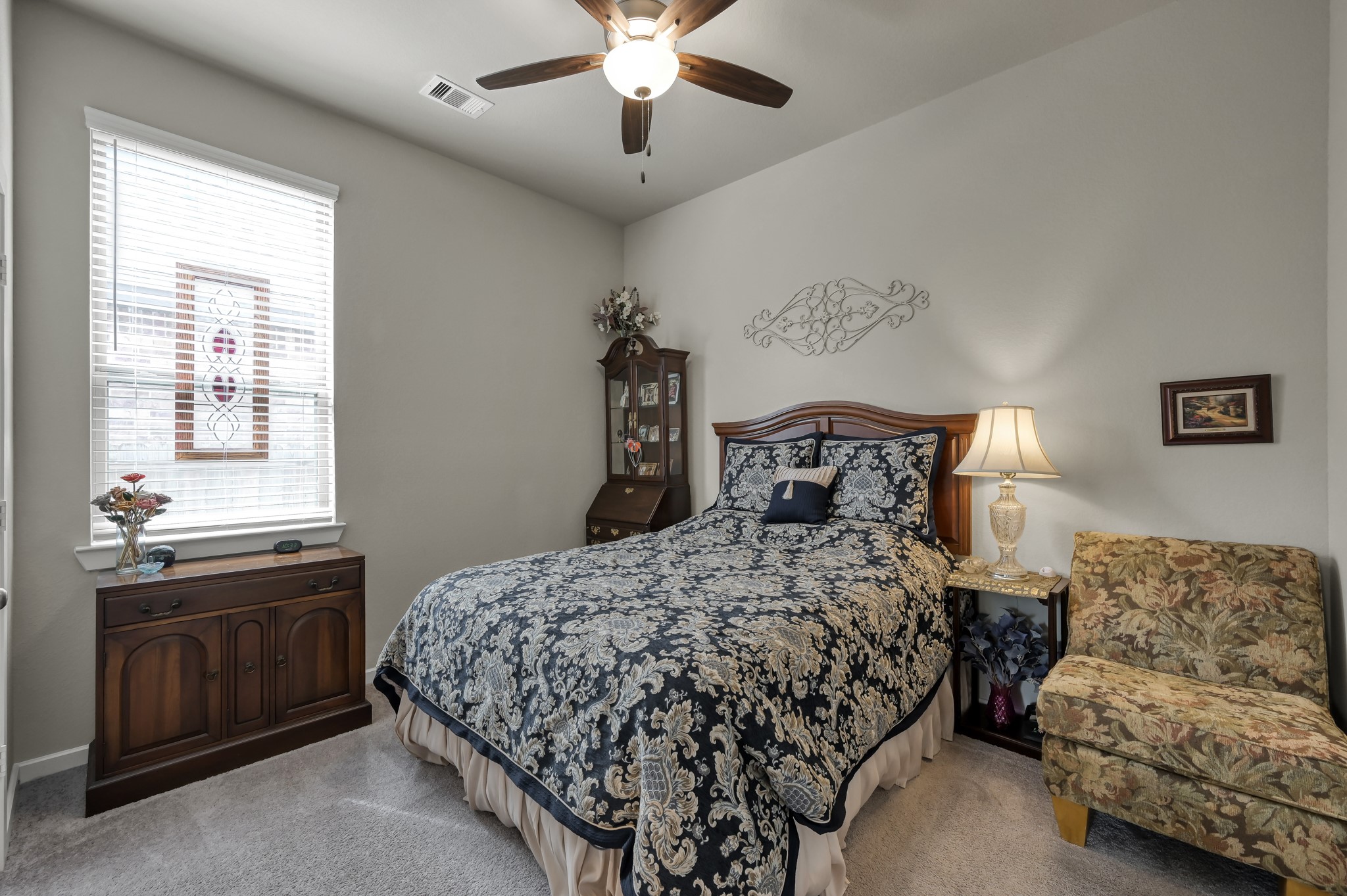 111 Yellow Perch Way Conroe, TX 77318 - Photo 19 of 35 Versatile secondary bedroom ideal for guests, family, or hobbies.