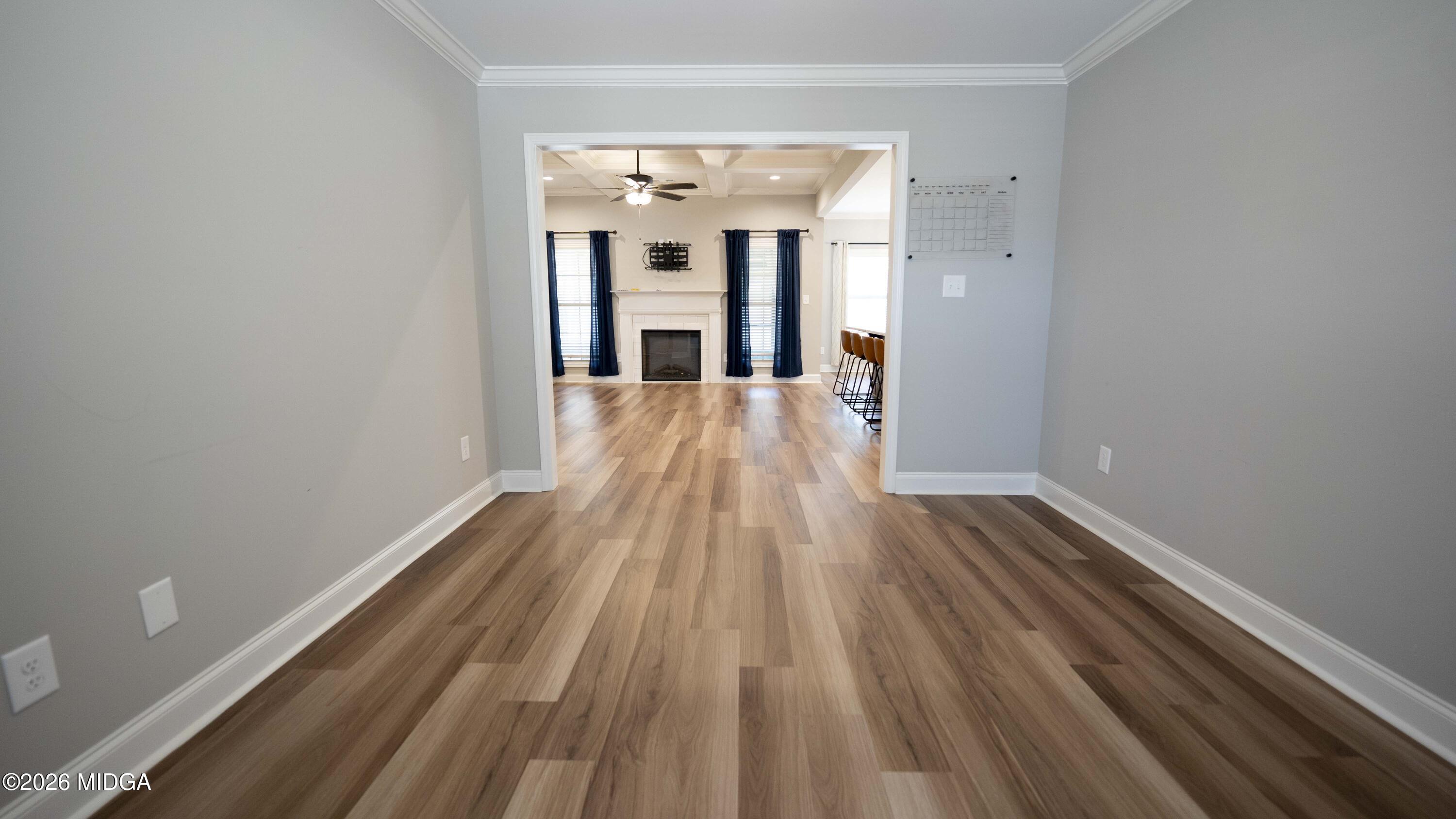 219 Otters Ridge Drive Kathleen, GA 31047 - Photo 20 of 44 wooden floor in an empty room with a window