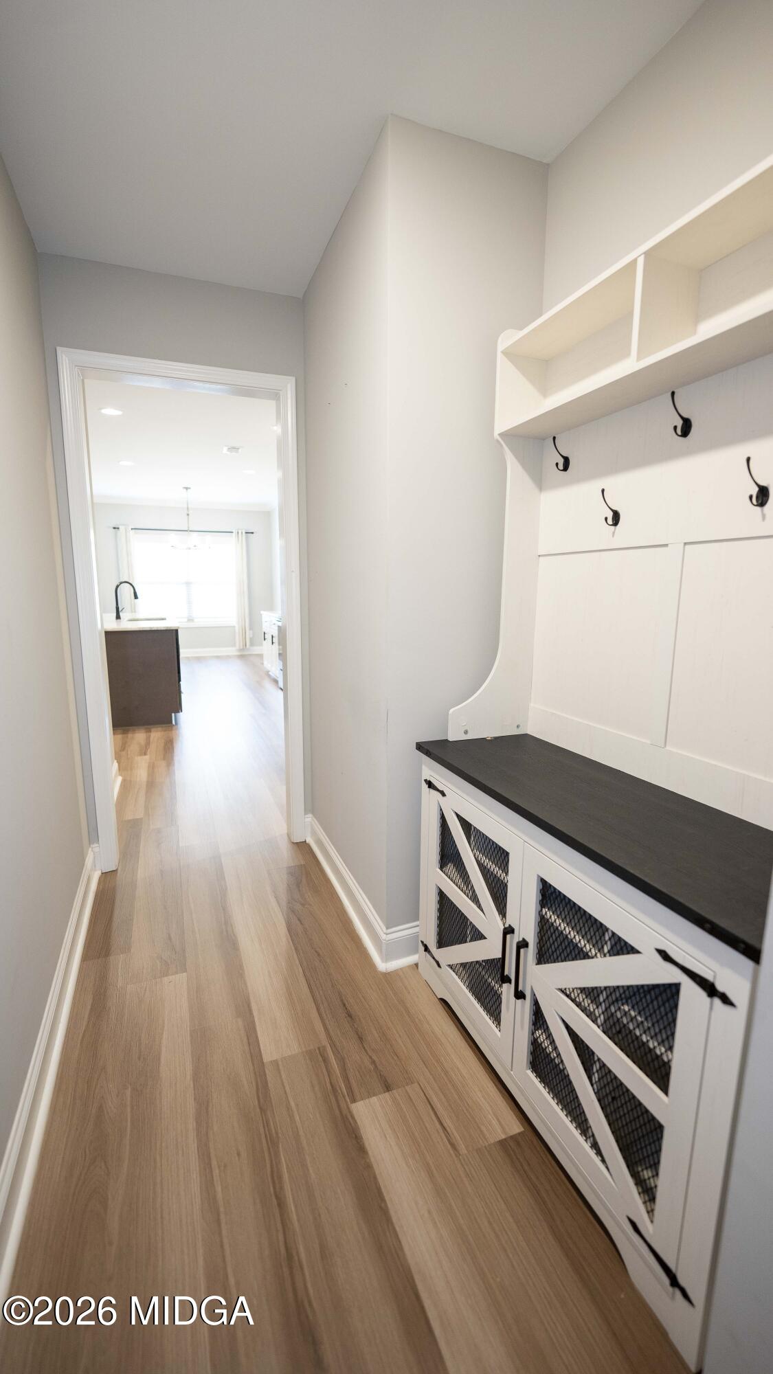 219 Otters Ridge Drive Kathleen, GA 31047 - Photo 36 of 44 a view of an empty room with wooden floor
