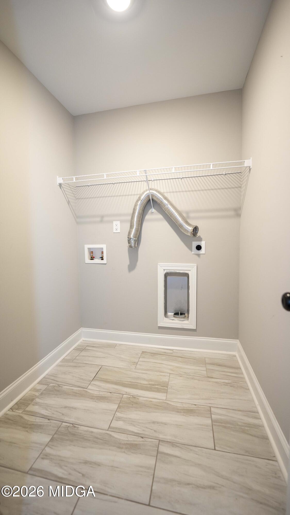 219 Otters Ridge Drive Kathleen, GA 31047 - Photo 37 of 44 a view of a room with wooden floor and white walls