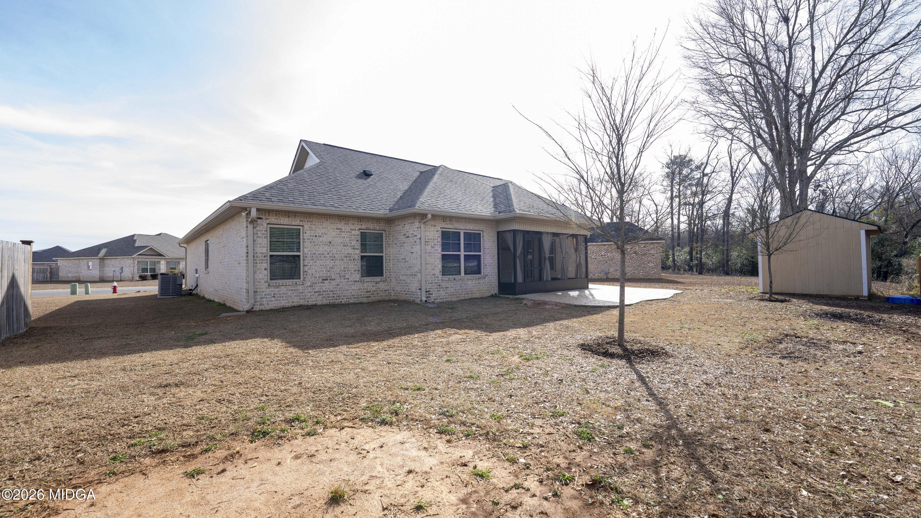 219 Otters Ridge Drive Kathleen, GA 31047 - Photo 41 of 44 a front view of a house with a yard and garage