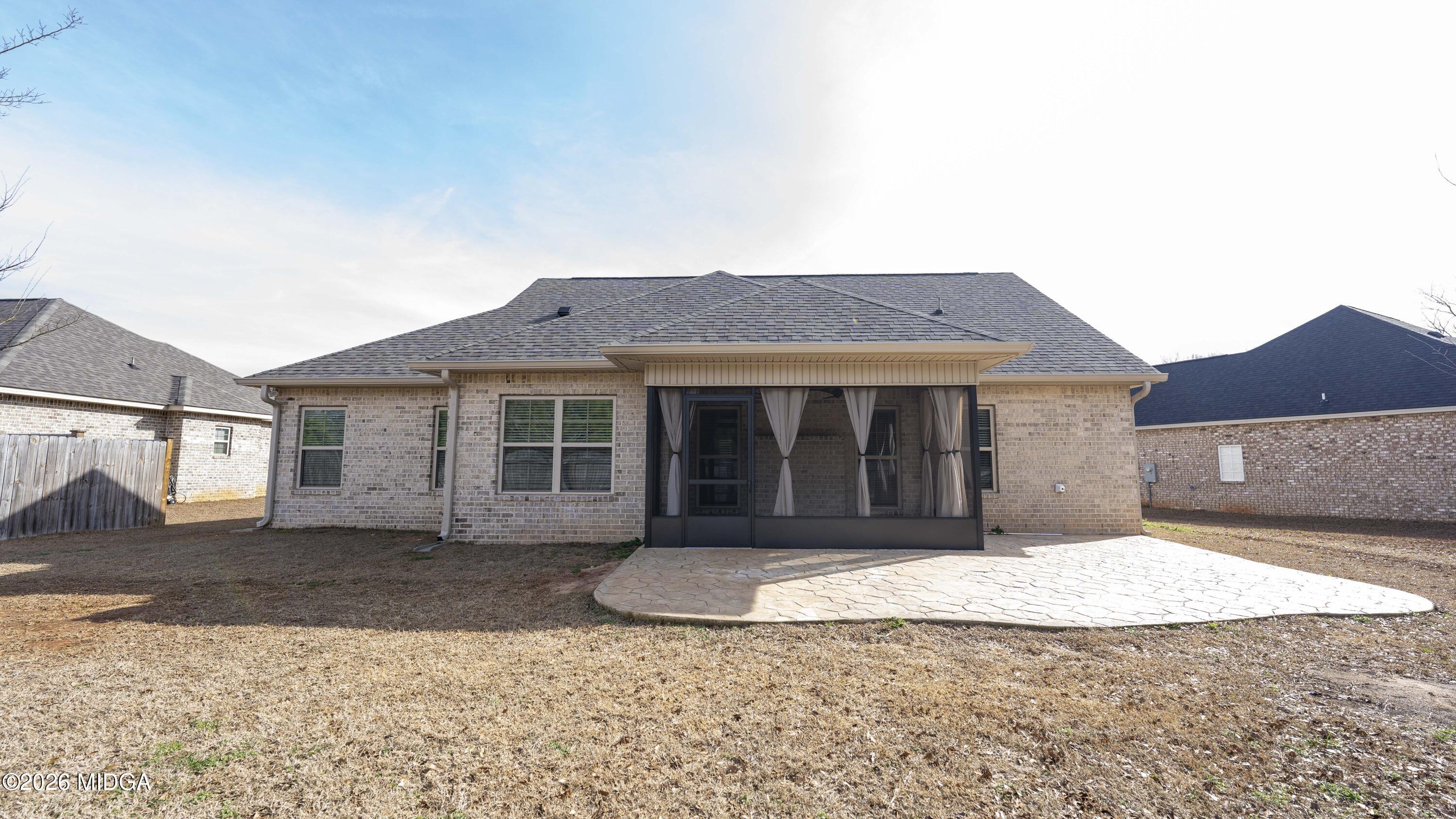219 Otters Ridge Drive Kathleen, GA 31047 - Photo 42 of 44 a front view of a house with a yard and garage