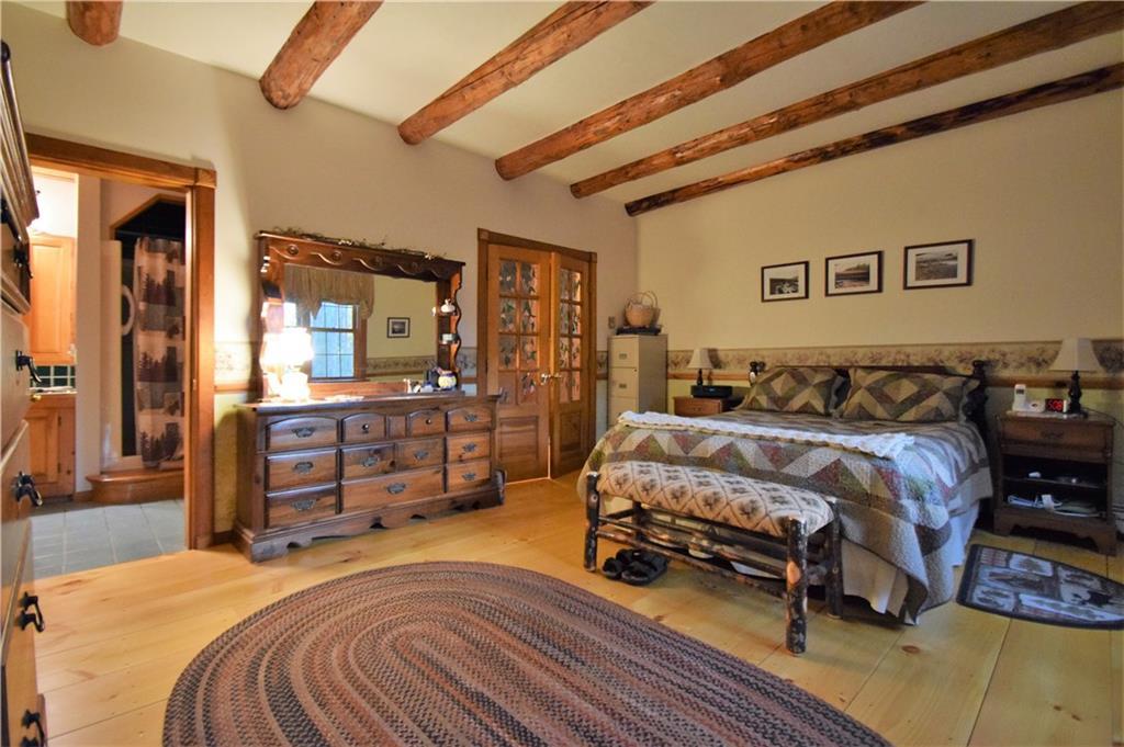 167 Harrison Road Naples, ME 04055 - Photo 14 of 30 Main floor master bedroom and...