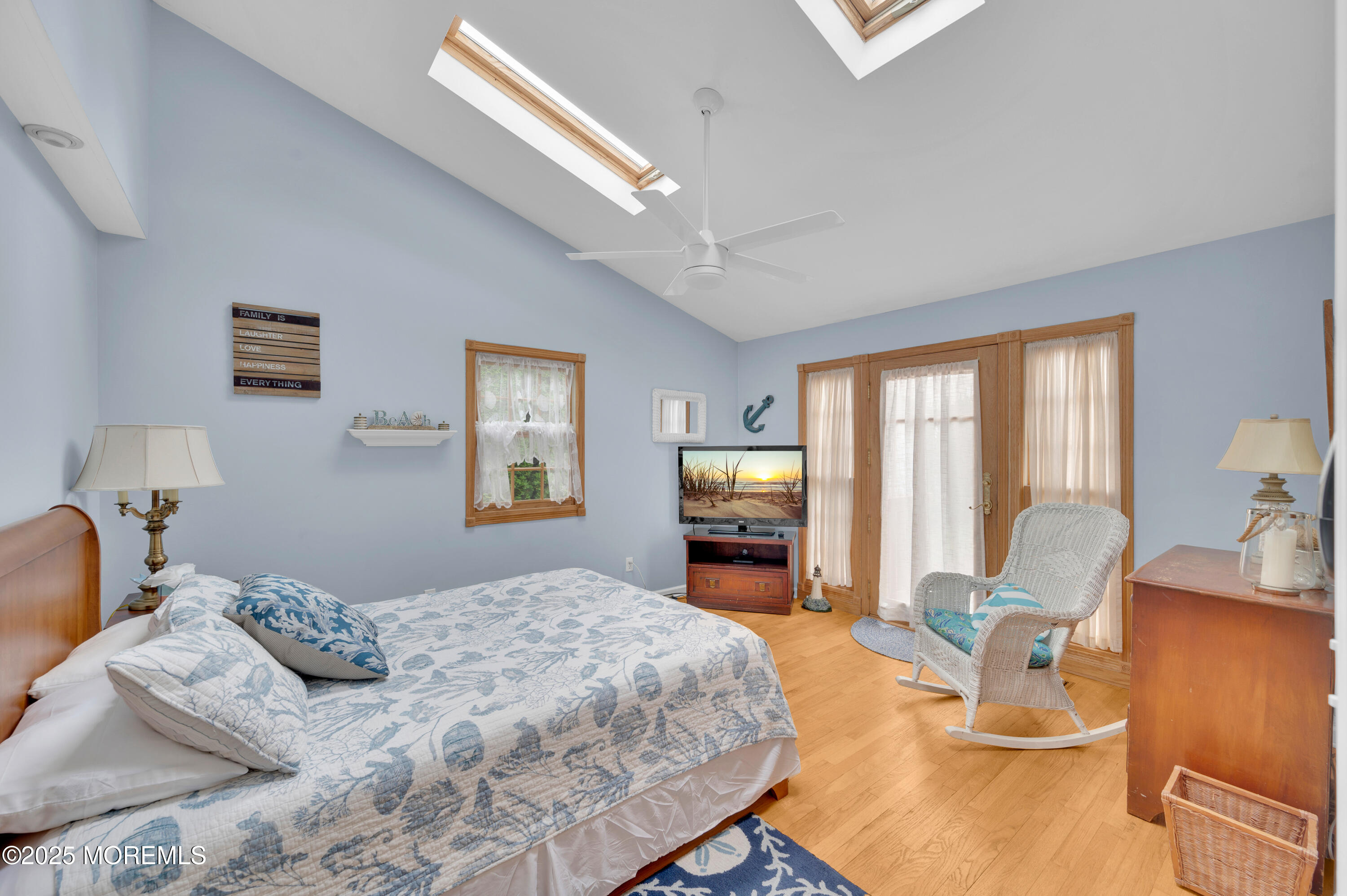 2203 3rd Avenue Spring Lake, NJ 07762 - Photo 11 of 27 a bedroom with a bed and wooden floor