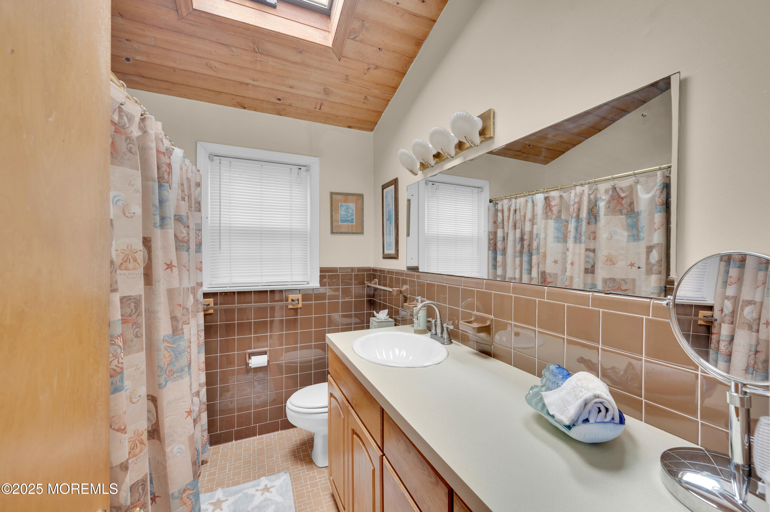 2203 3rd Avenue Spring Lake, NJ 07762 - Photo 13 of 27 a bathroom with a sink toilet and shower