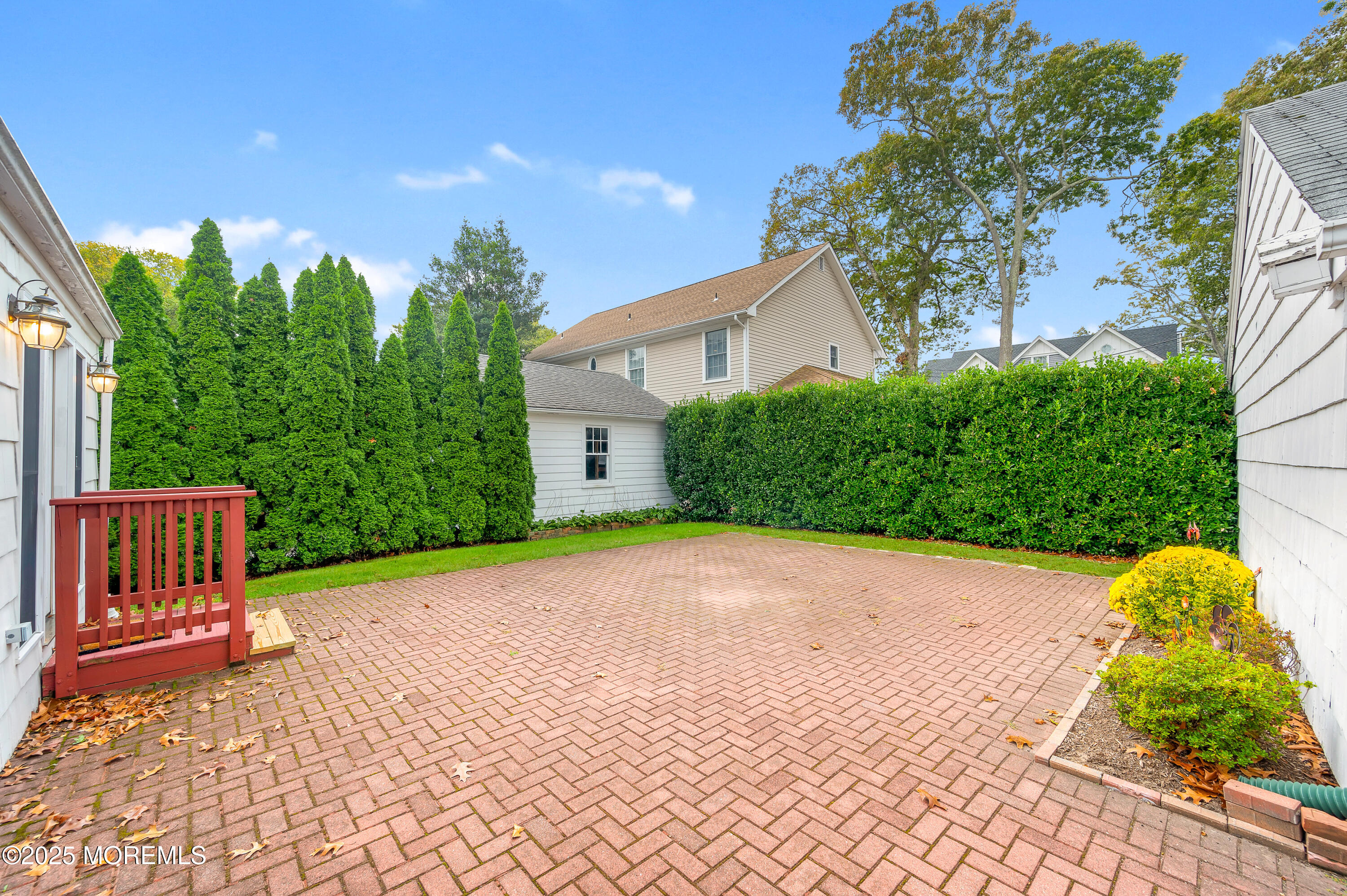 2203 3rd Avenue Spring Lake, NJ 07762 - Photo 21 of 27 a front view of a house with garden