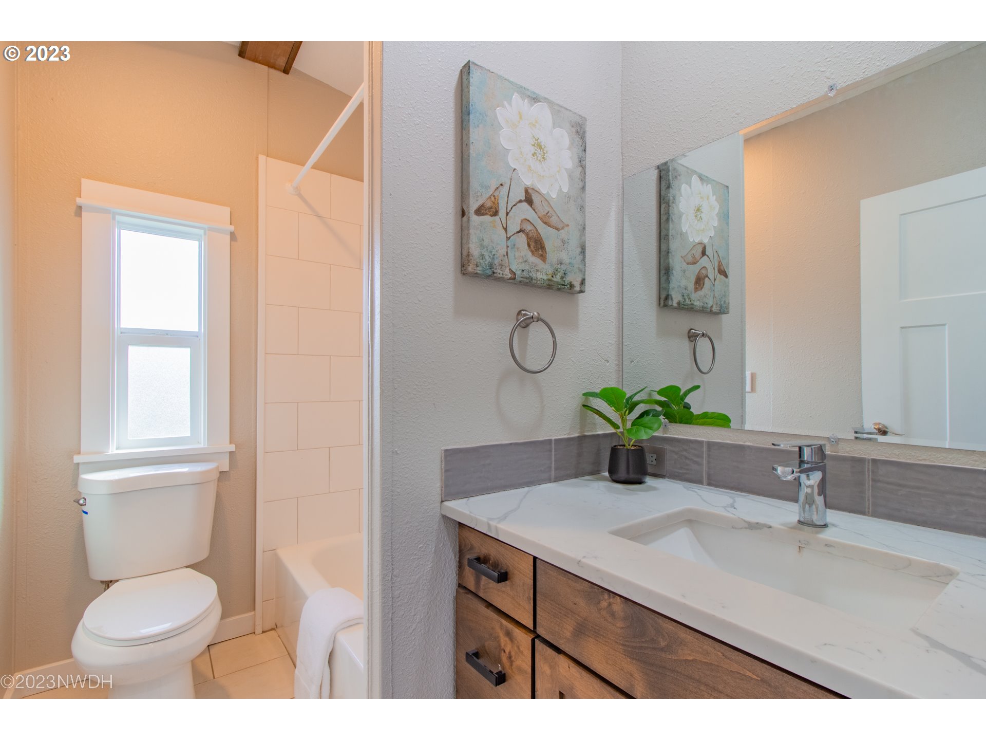 1625 River Loop 1 Eugene, OR 97404 - Photo 15 of 32 a bathroom with a granite countertop sink and a mirror