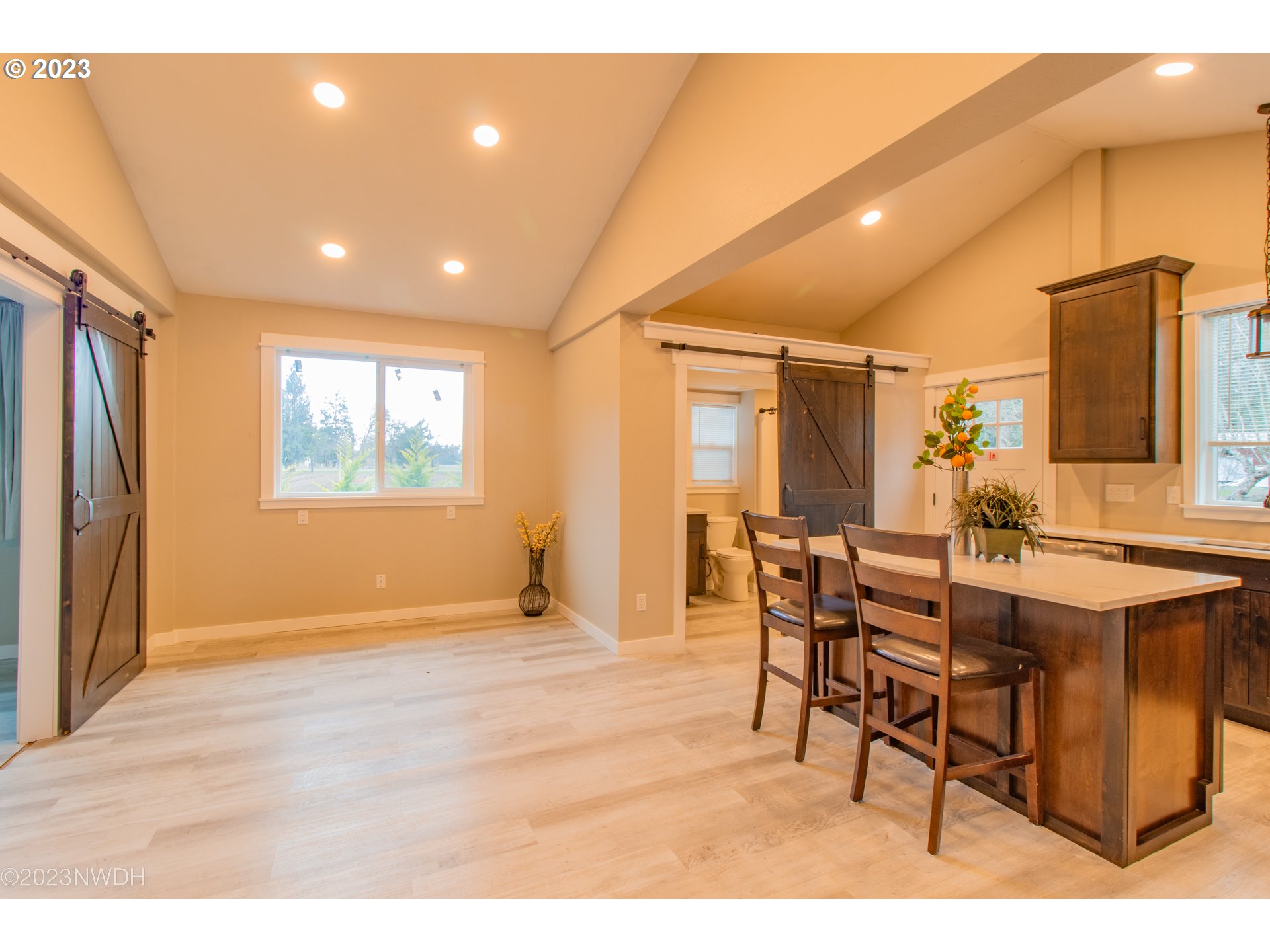 1625 River Loop 1 Eugene, OR 97404 - Photo 22 of 32 a view of a dining room with furniture and a window
