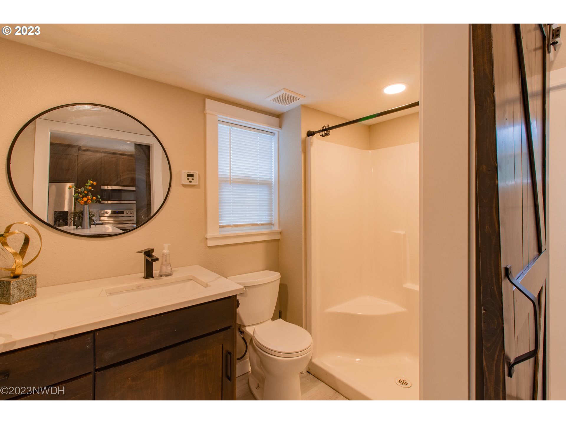 1625 River Loop 1 Eugene, OR 97404 - Photo 23 of 32 a bathroom with a sink mirror and toilet