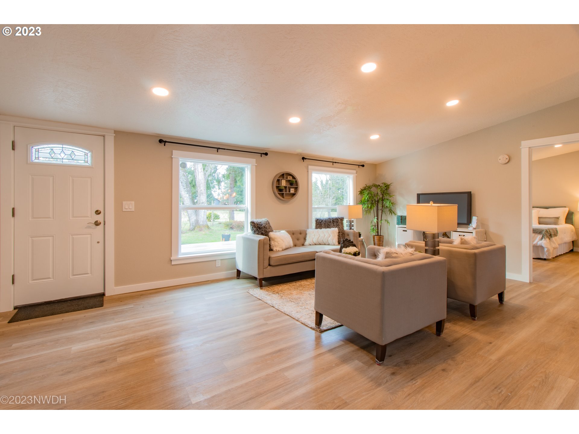 1625 River Loop 1 Eugene, OR 97404 - Photo 3 of 32 a living room with furniture and a wooden floor