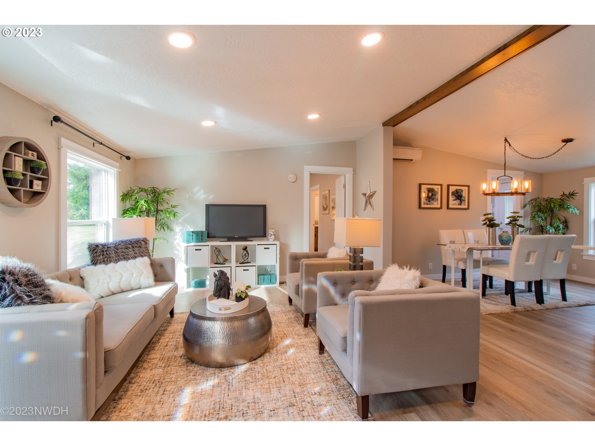 1625 River Loop 1 Eugene, OR 97404 - Photo 4 of 32 a living room with furniture and a flat screen tv