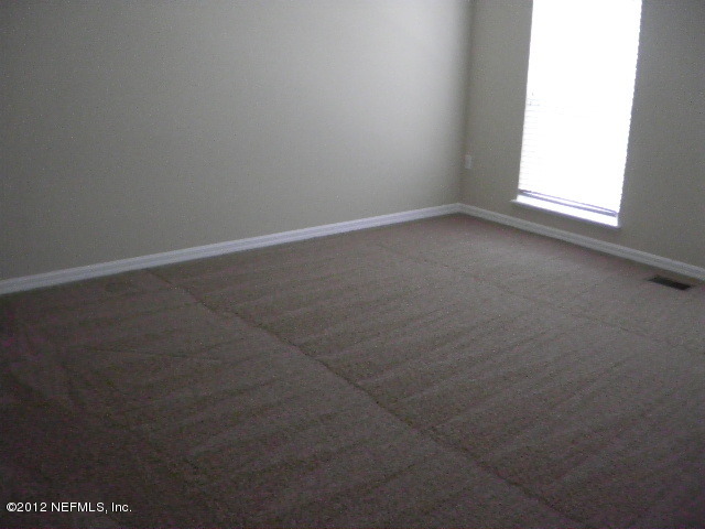 10511 Autumn Trace Road Jacksonville, FL 32257 - Photo 6 of 10 1st Bedroom