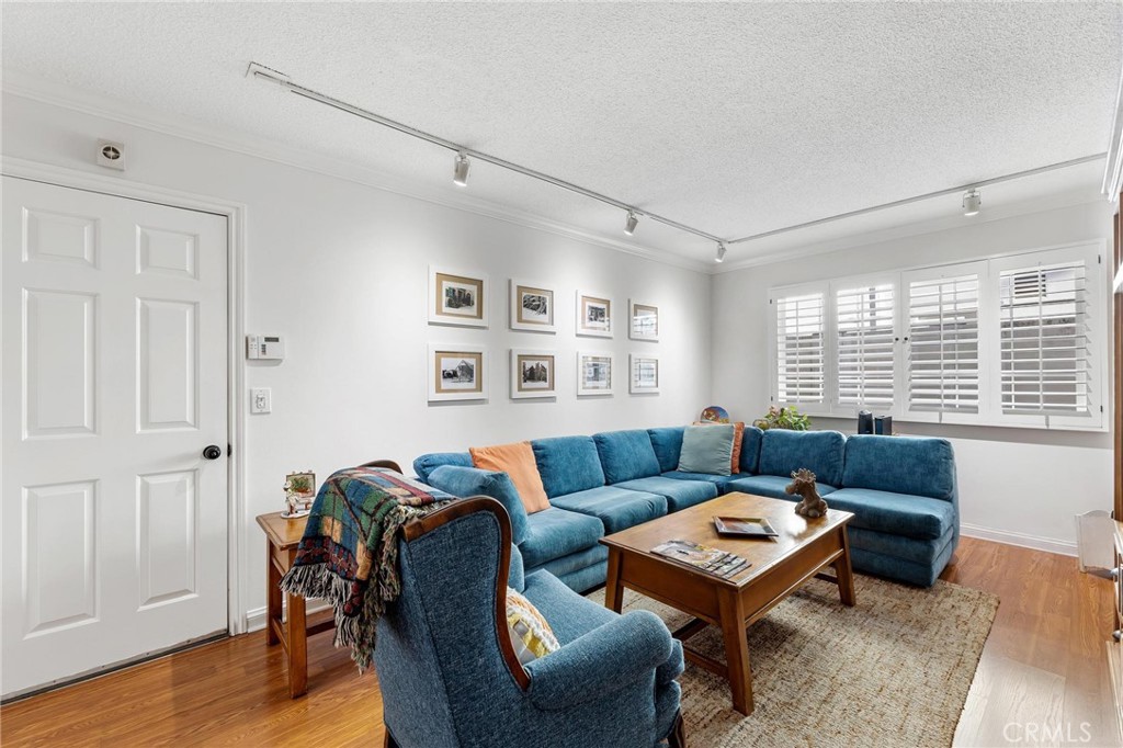 10800 Bismarck Avenue Porter Ranch, CA 91326 - Photo 16 of 29 a living room with furniture and a window