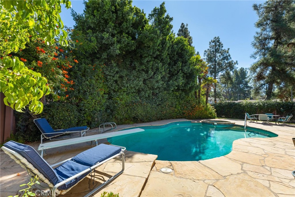 10800 Bismarck Avenue Porter Ranch, CA 91326 - Photo 27 of 29 a view of a backyard with a patio