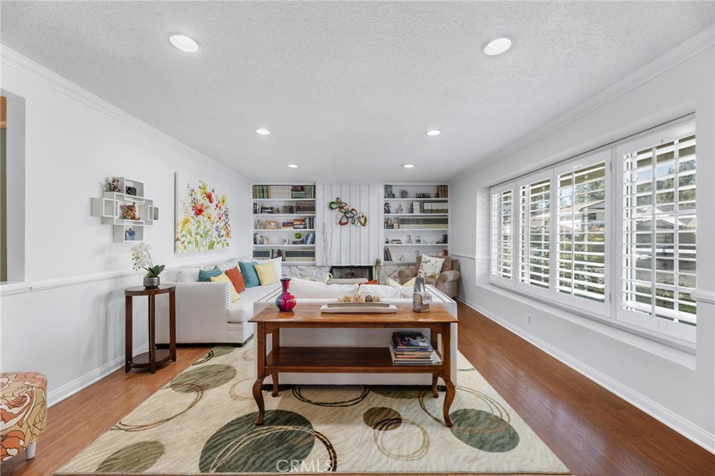 10800 Bismarck Avenue Porter Ranch, CA 91326 - Photo 3 of 29 a reading room with furniture and a window