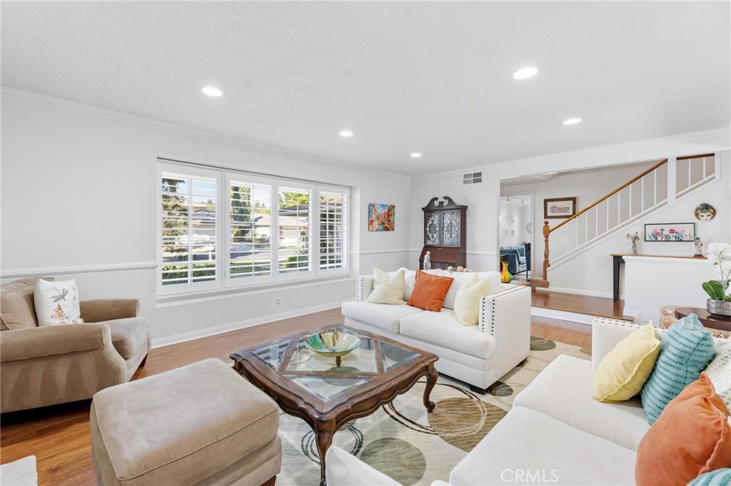 10800 Bismarck Avenue Porter Ranch, CA 91326 - Photo 5 of 29 a living room with furniture and a window