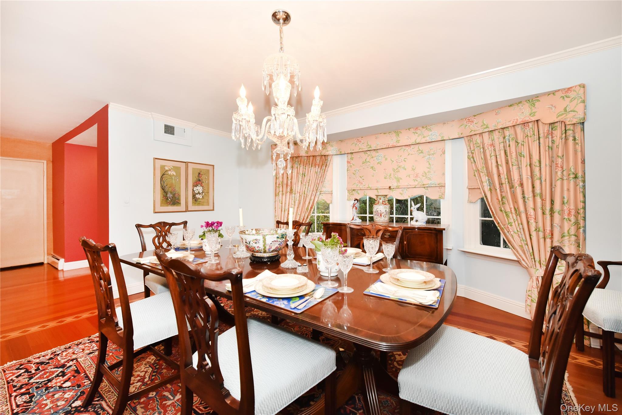 11 Joy Drive Manhasset Hills, NY 11040 - Photo 12 of 41 a view of a dining room with furniture window and wooden floor