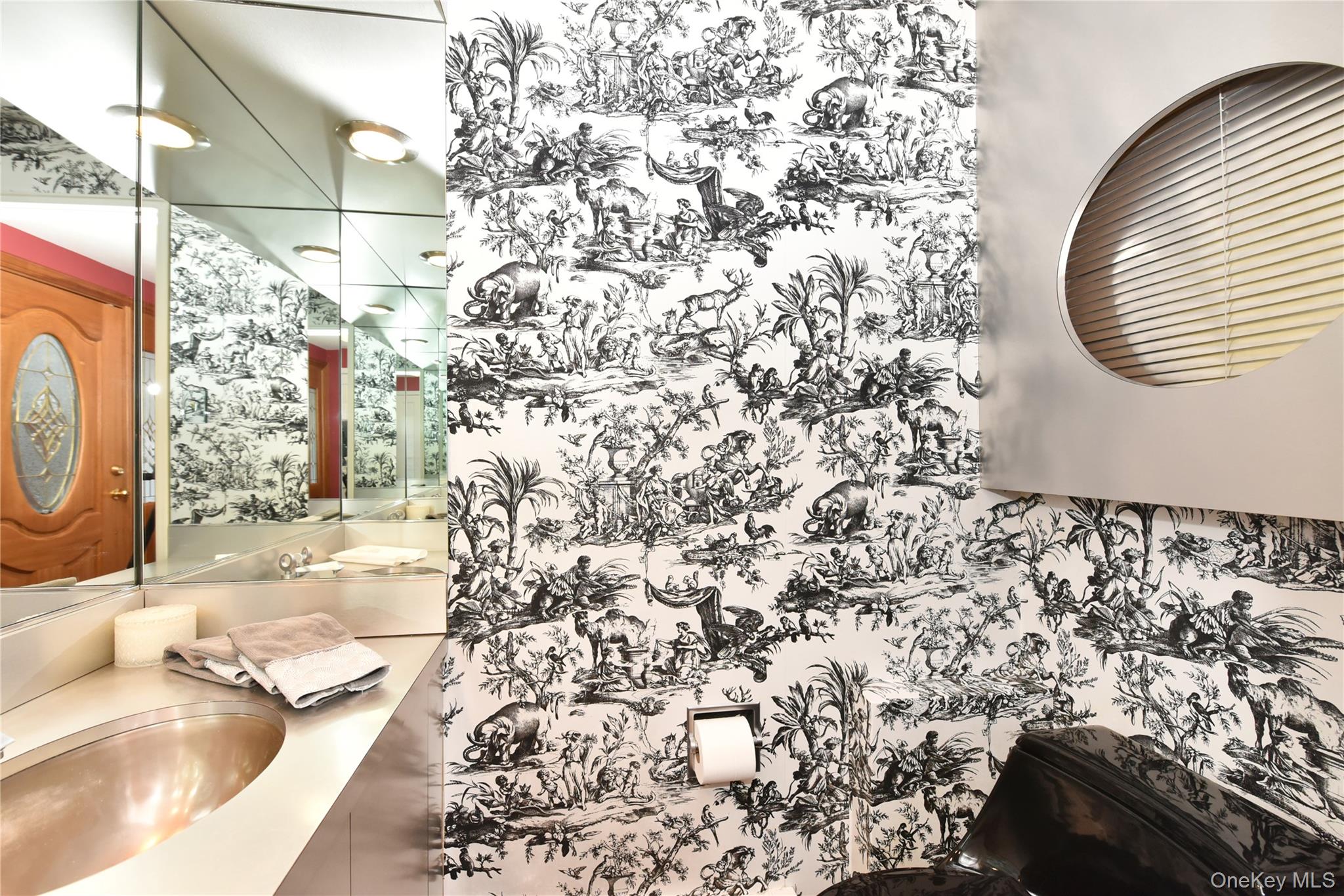 11 Joy Drive Manhasset Hills, NY 11040 - Photo 19 of 41 a bathroom with a sink and a mirror