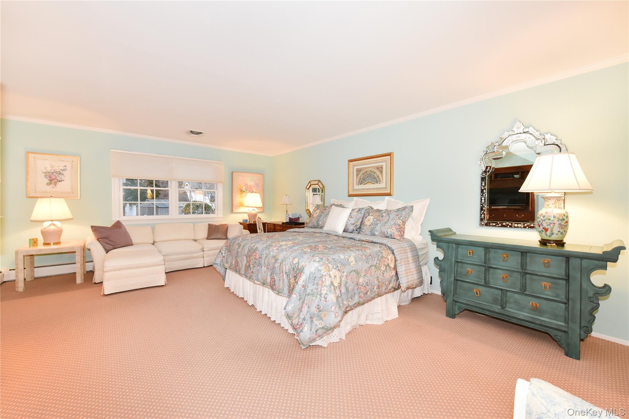 11 Joy Drive Manhasset Hills, NY 11040 - Photo 26 of 41 a spacious bedroom with a bed couch and window