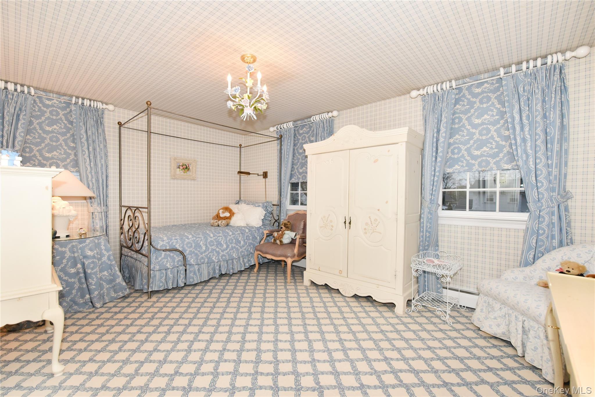 11 Joy Drive Manhasset Hills, NY 11040 - Photo 29 of 41 a living room with a couch