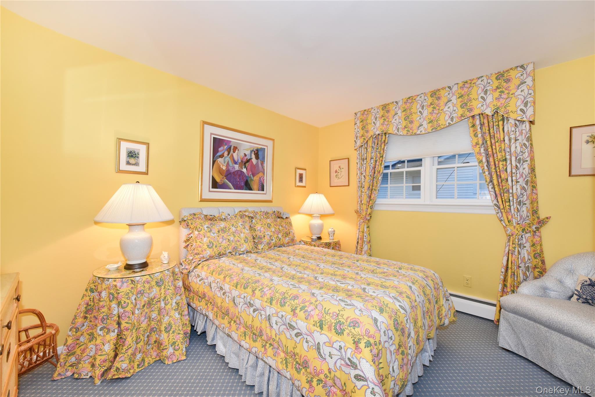 11 Joy Drive Manhasset Hills, NY 11040 - Photo 31 of 41 a spacious bedroom with a bed and a couch