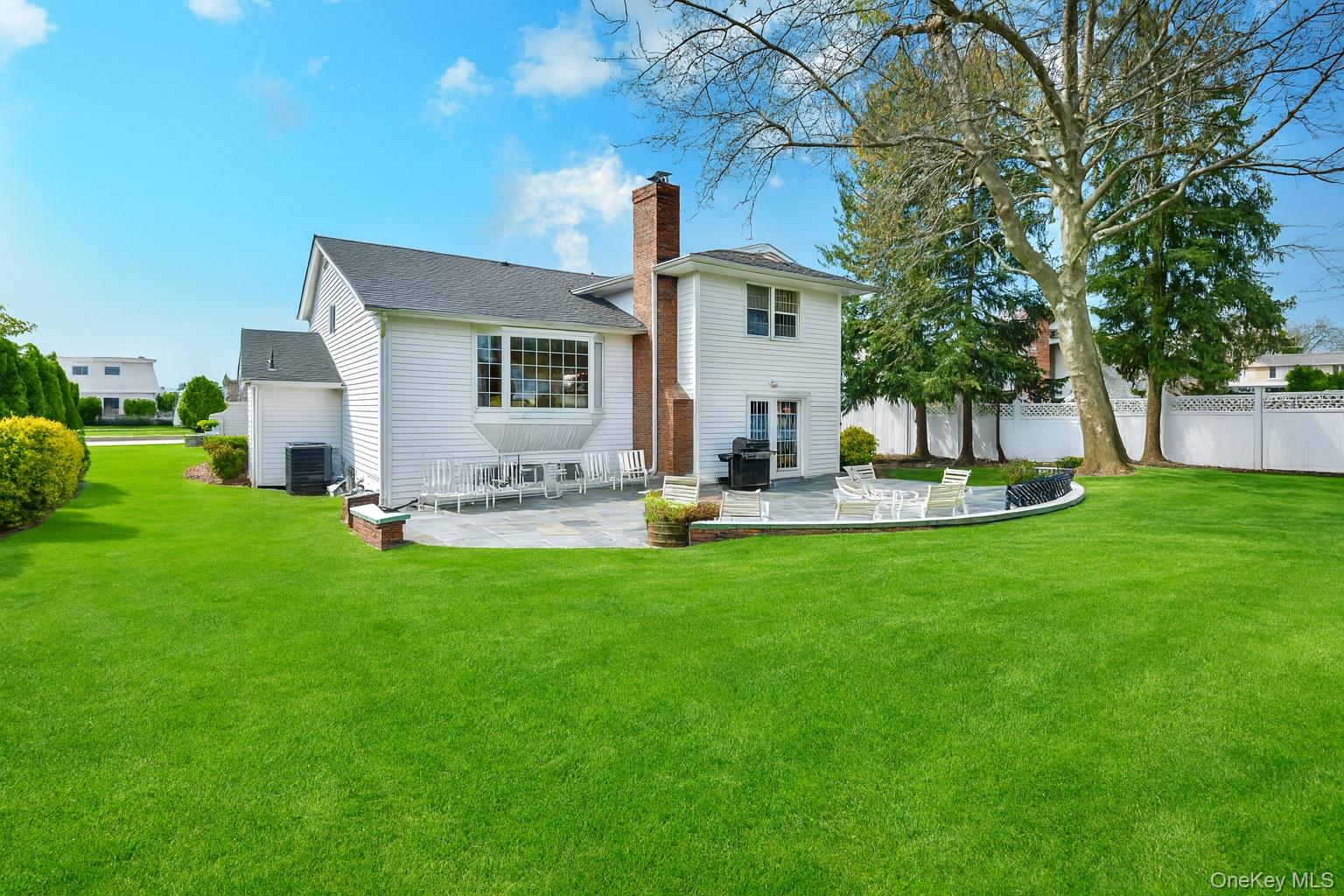11 Joy Drive Manhasset Hills, NY 11040 - Photo 38 of 41 a front view of house with yard