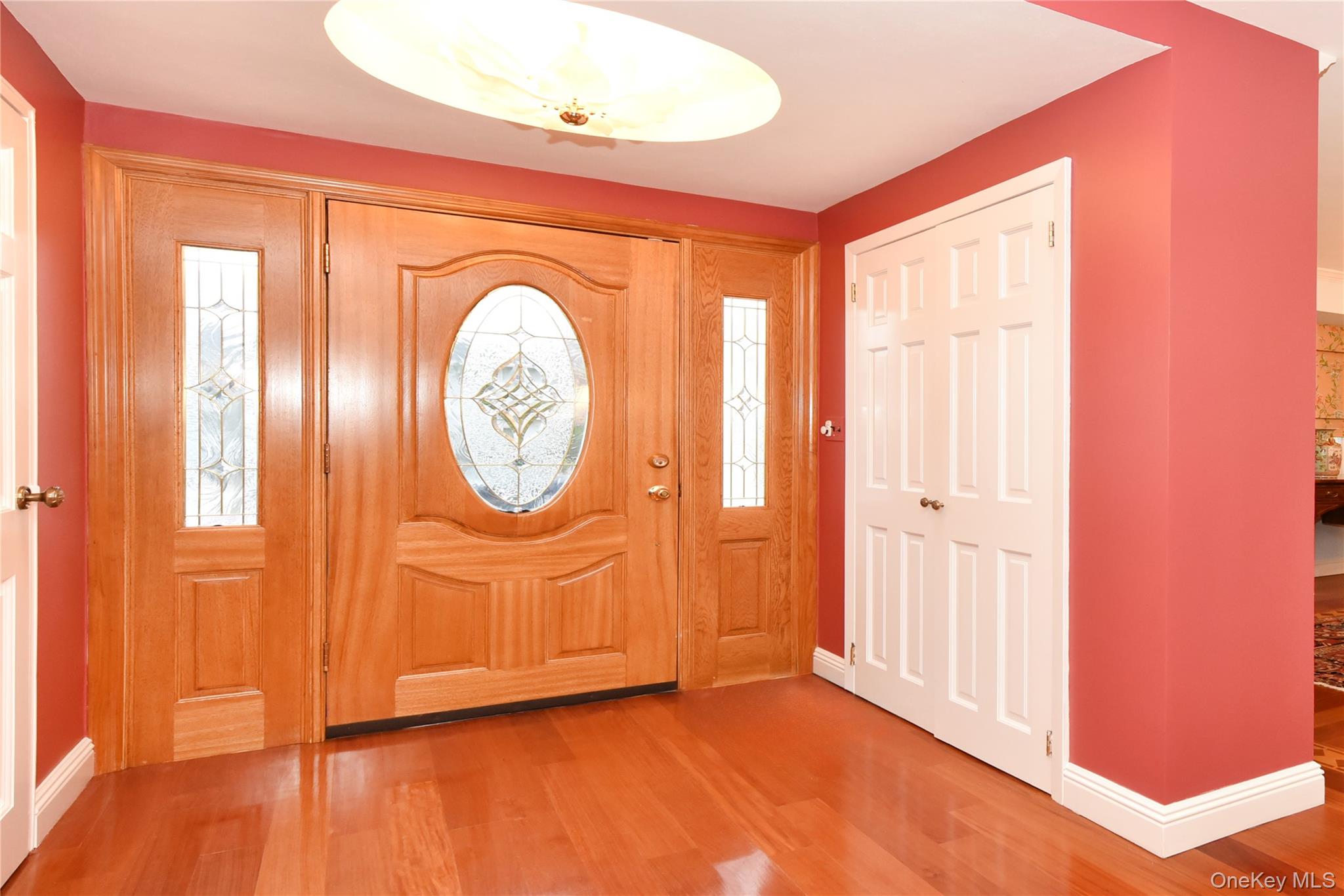 11 Joy Drive Manhasset Hills, NY 11040 - Photo 5 of 41 wooden floor in a room with a window