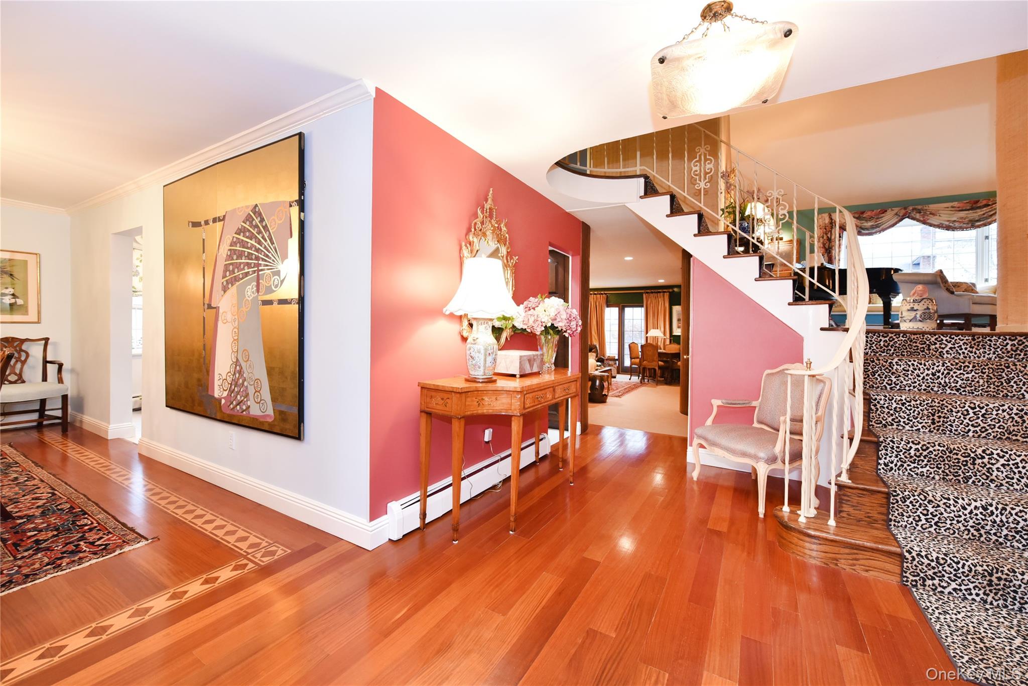 11 Joy Drive Manhasset Hills, NY 11040 - Photo 6 of 41 a view of a living room with furniture and wooden floor
