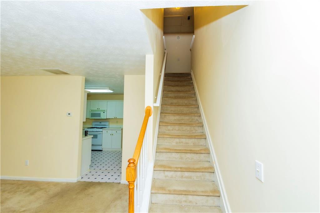 3440 Maple Valley Drive Cumming, GA 30040 - Photo 18 of 73 a view of a room with a fireplace