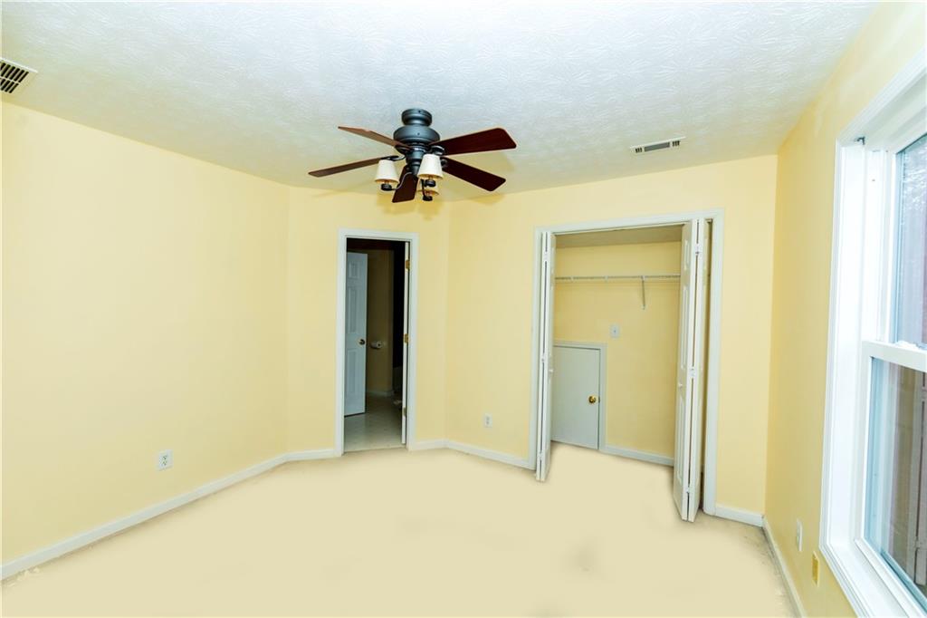3440 Maple Valley Drive Cumming, GA 30040 - Photo 33 of 73 a view of an empty room