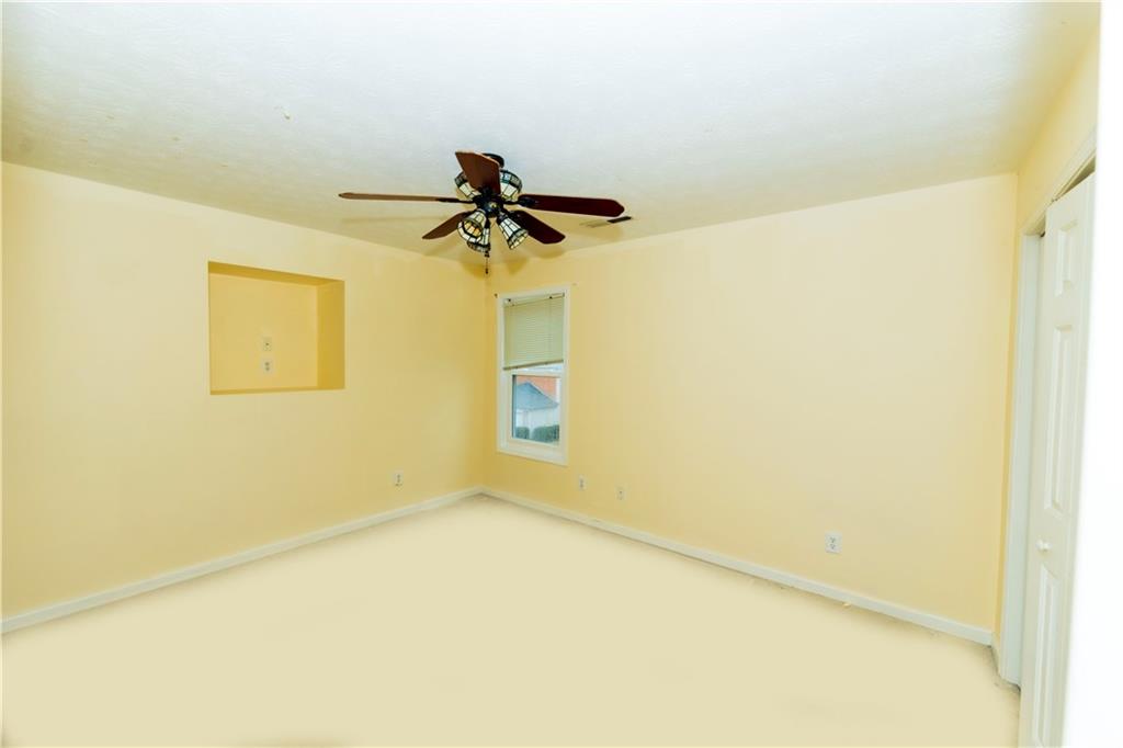 3440 Maple Valley Drive Cumming, GA 30040 - Photo 35 of 73 a view of a big room with a wooden wall