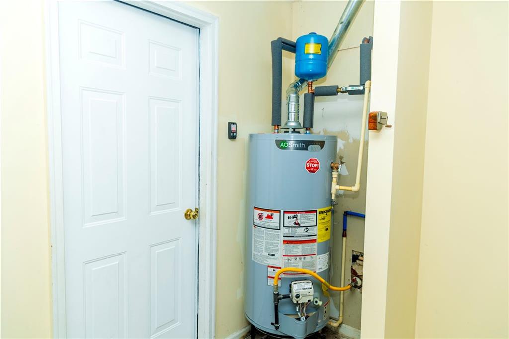 3440 Maple Valley Drive Cumming, GA 30040 - Photo 56 of 73 a utility room with dryer and washer