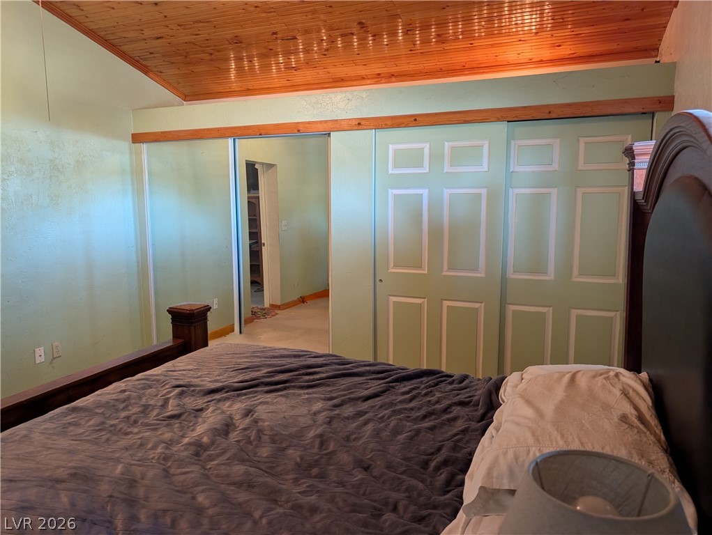 997 Phillips Street Panaca, NV 89042 - Photo 11 of 19 A well-appointed sleeping sanctuary awaits, offering ample storage with its paneled closet doors and mirrored sliders.