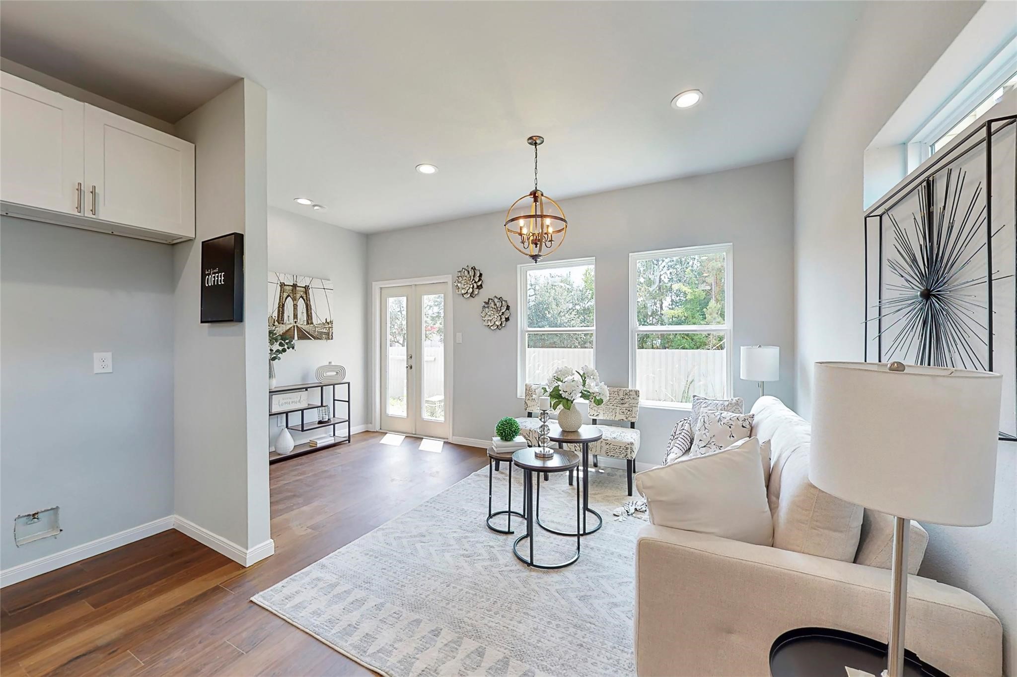 18813 Luminescent Lane Spring, TX 77379 - Photo 3 of 19 a living room with furniture and a large window