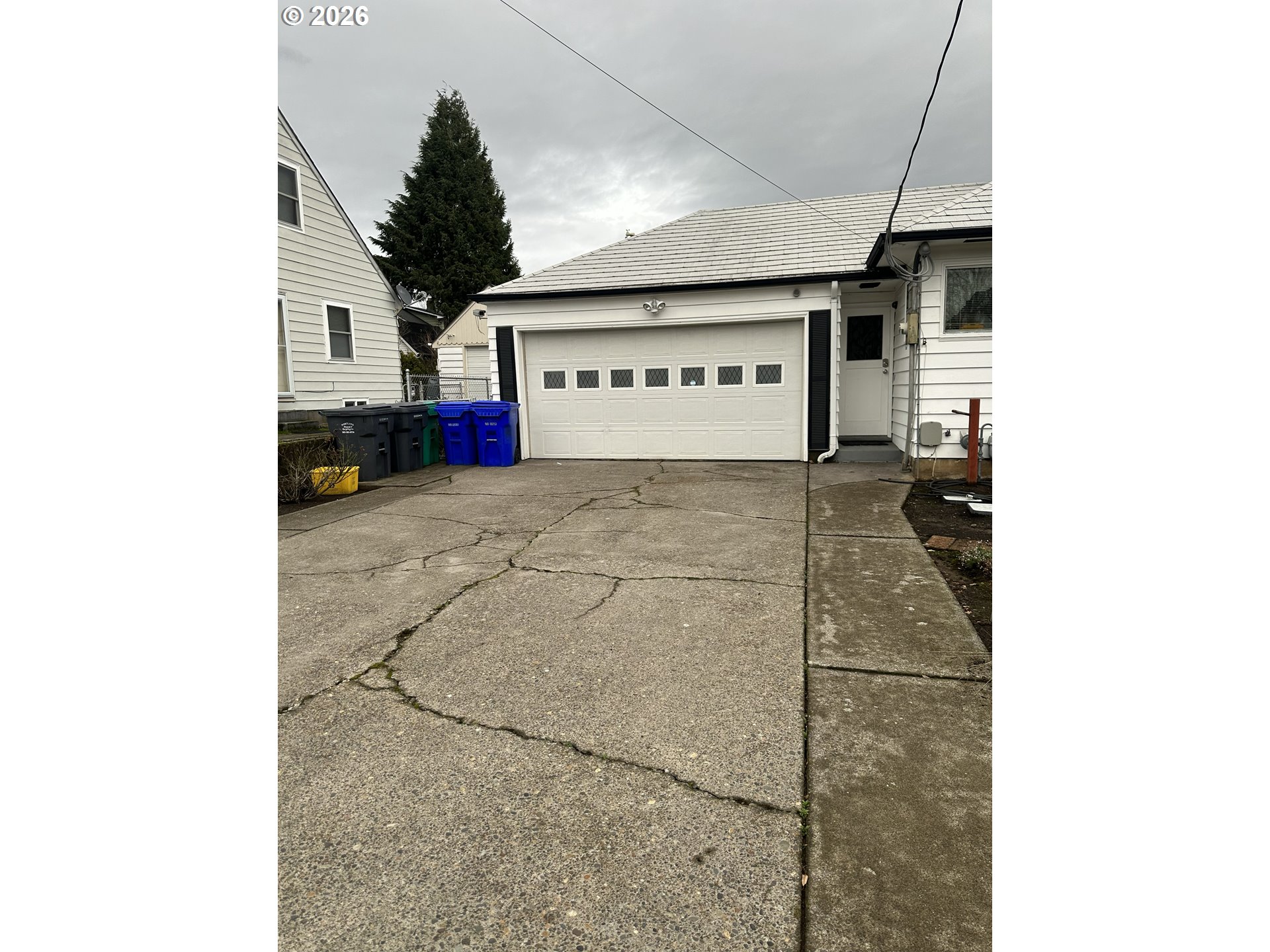144 Southeast 85th Avenue Portland, OR 97216 - Photo 2 of 43 a view of a car garage
