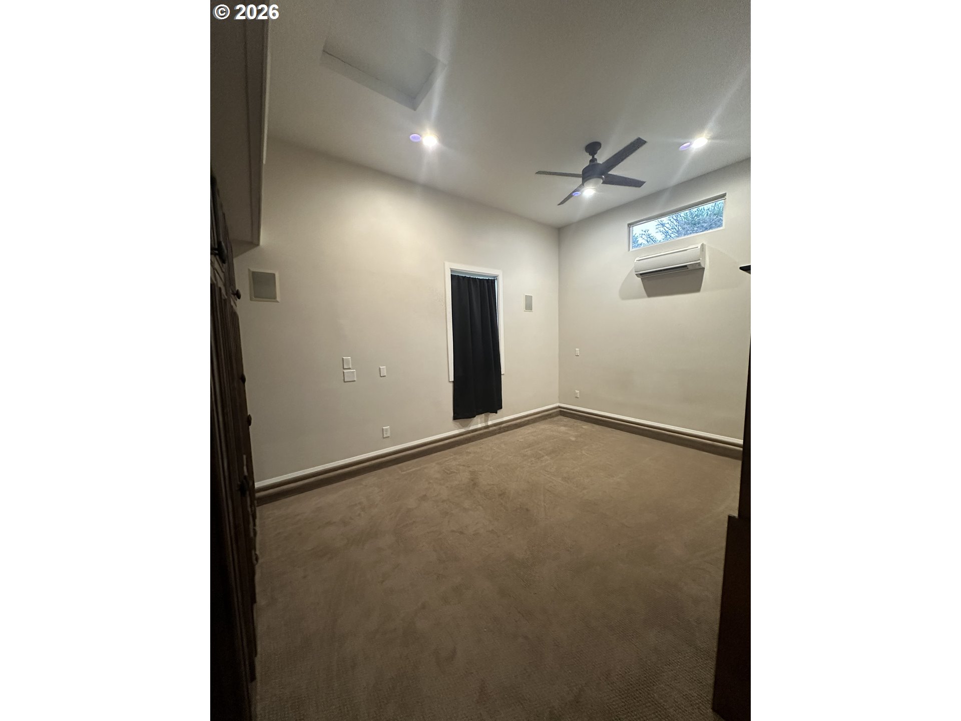 144 Southeast 85th Avenue Portland, OR 97216 - Photo 32 of 43 a view of a big room with carpet