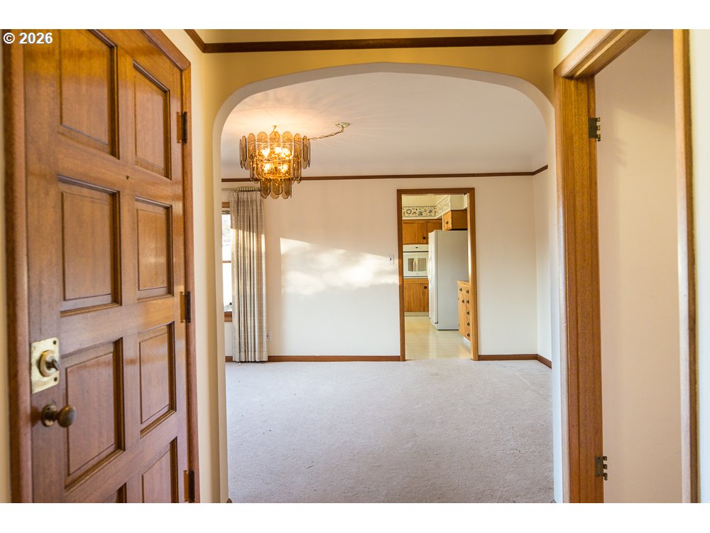144 Southeast 85th Avenue Portland, OR 97216 - Photo 38 of 43 a view of empty room with a glass door